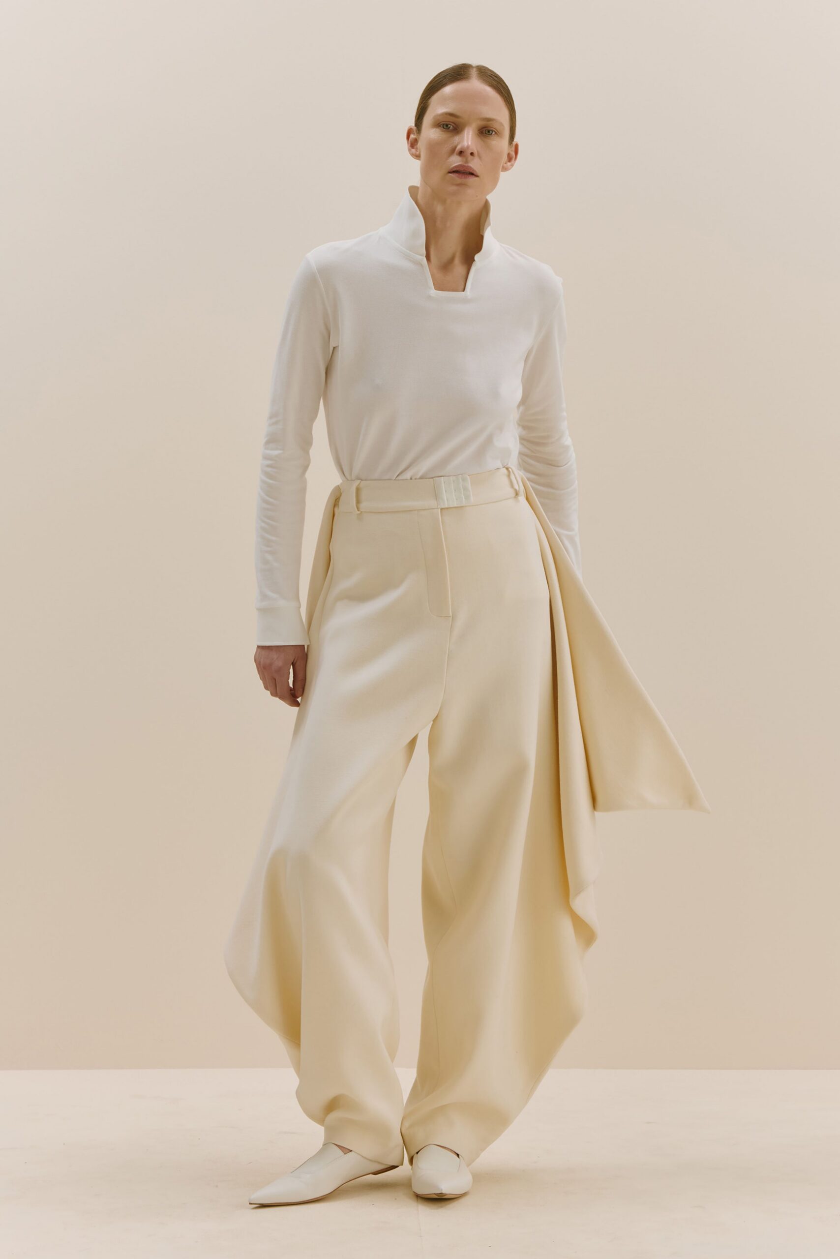 white fitted shirt beige wide-leg pants