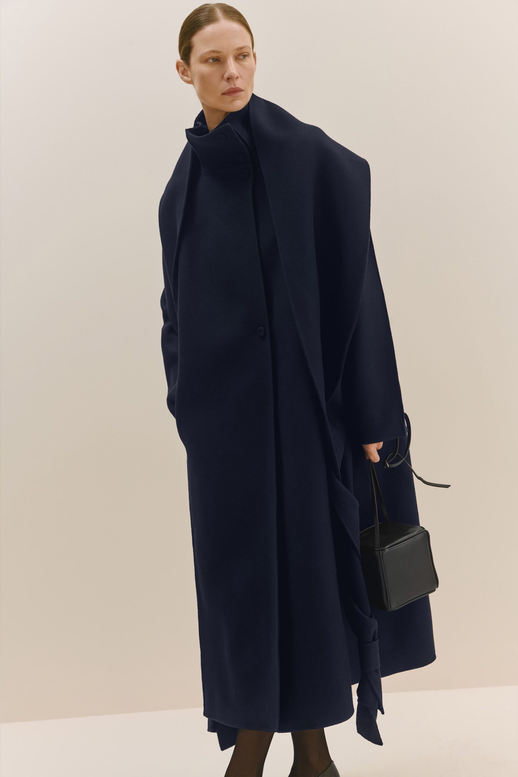 black wool long-sleeve collared relaxed belted maxi coat