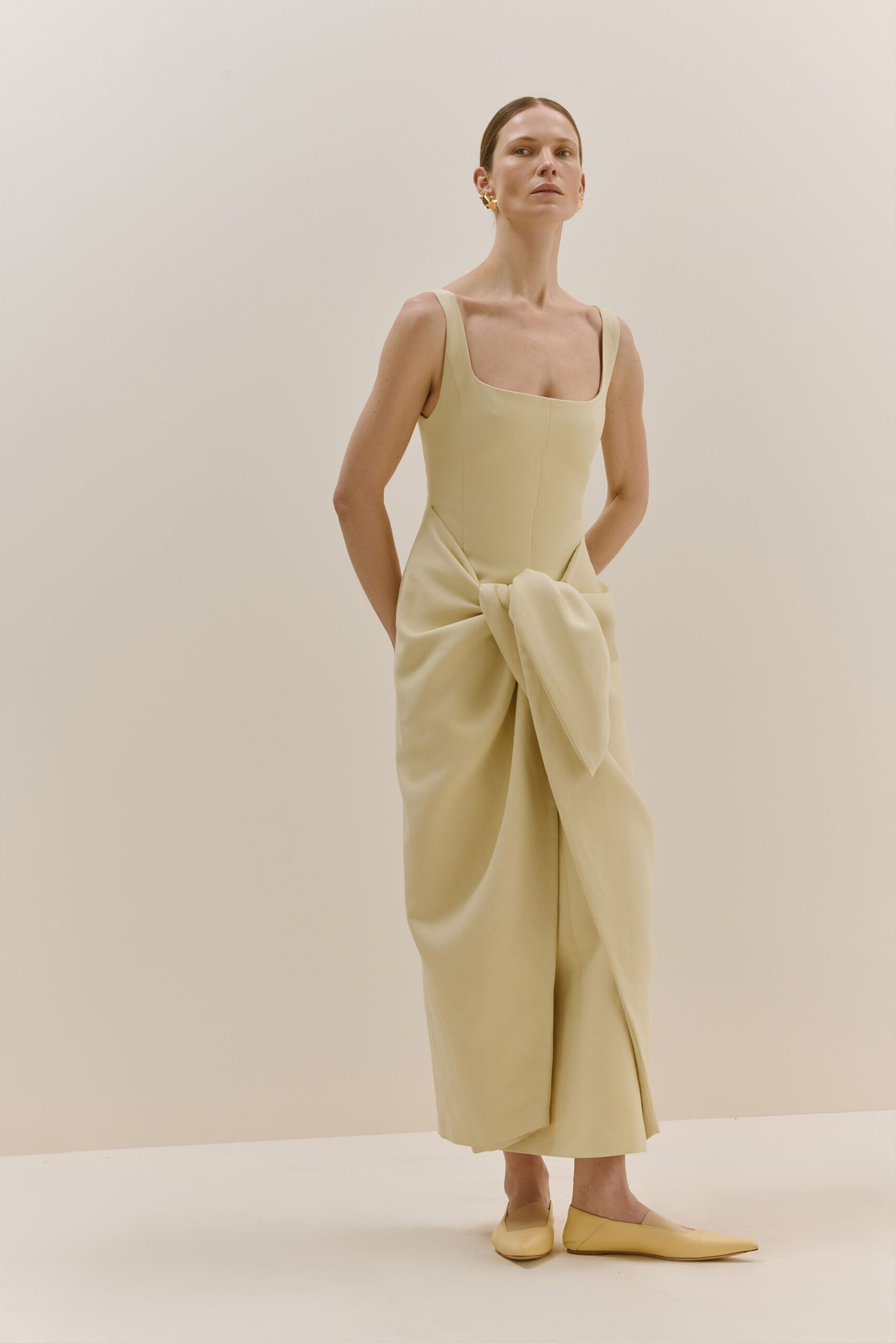 yellow cotton sleeveless square-neck fitted draped midi dress