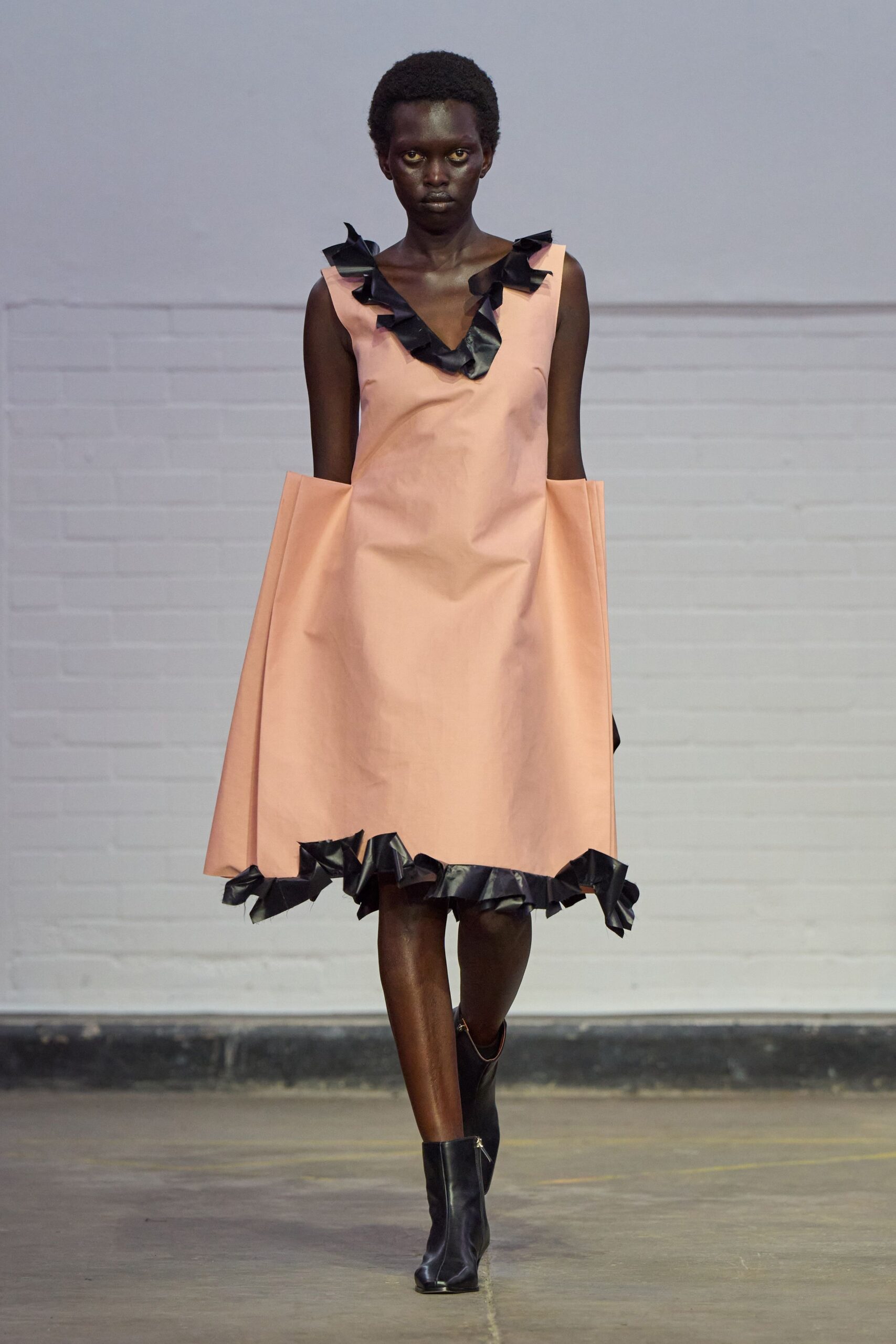 pink cotton sleeveless v-neck fitted ruffled mini dress