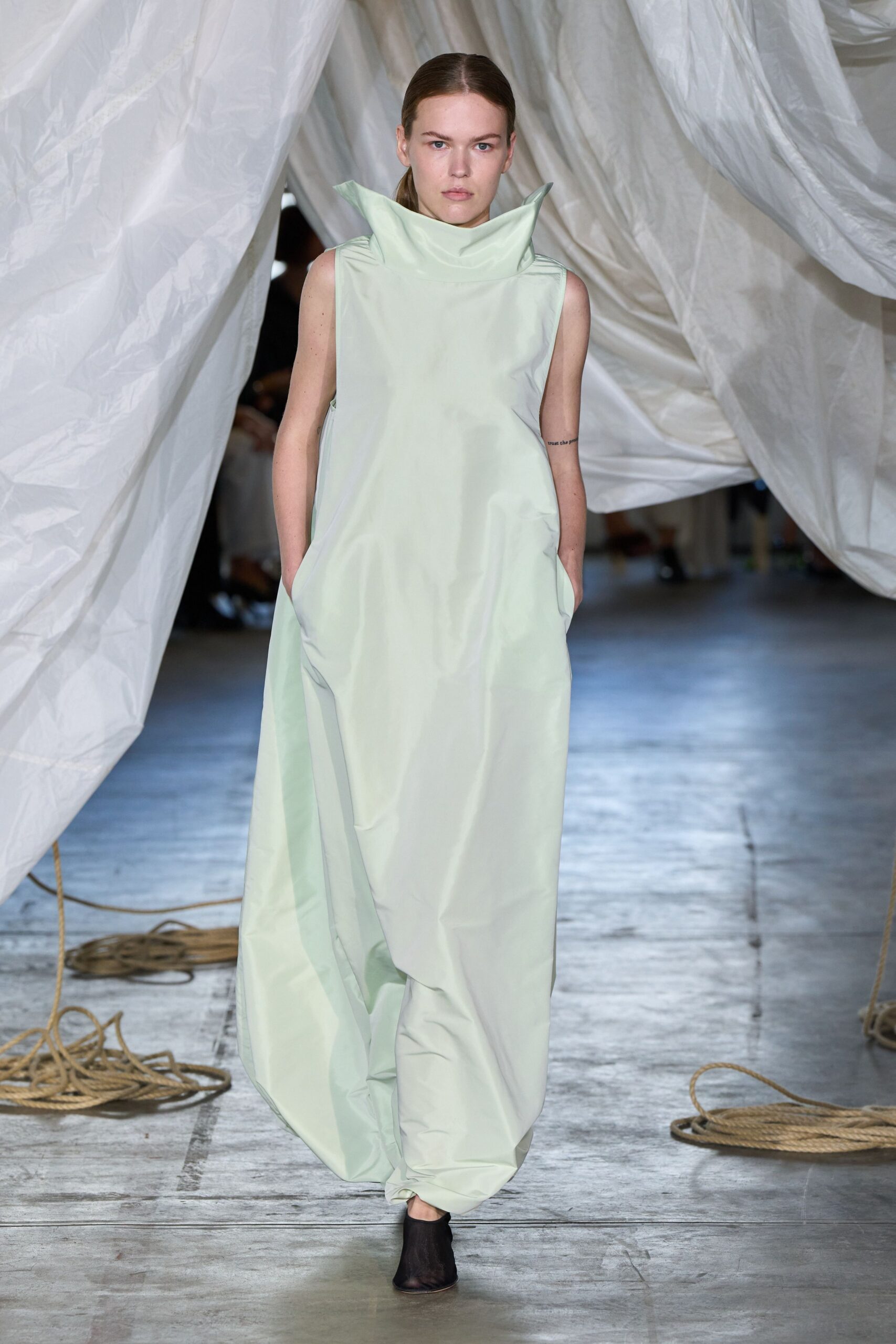 green cotton sleeveless high-neck relaxed draped pockets dress