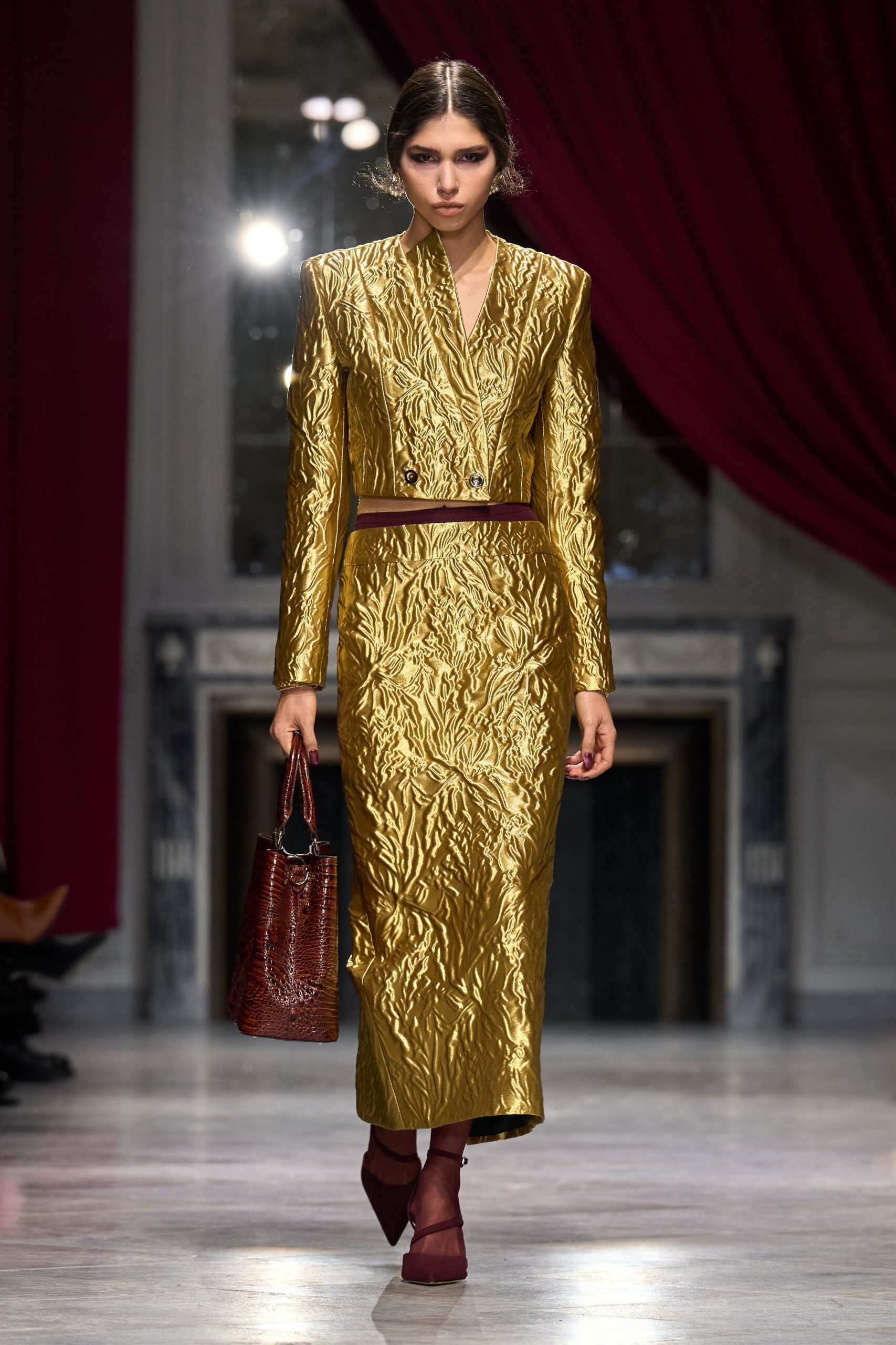 gold embroidered long-sleeve gown