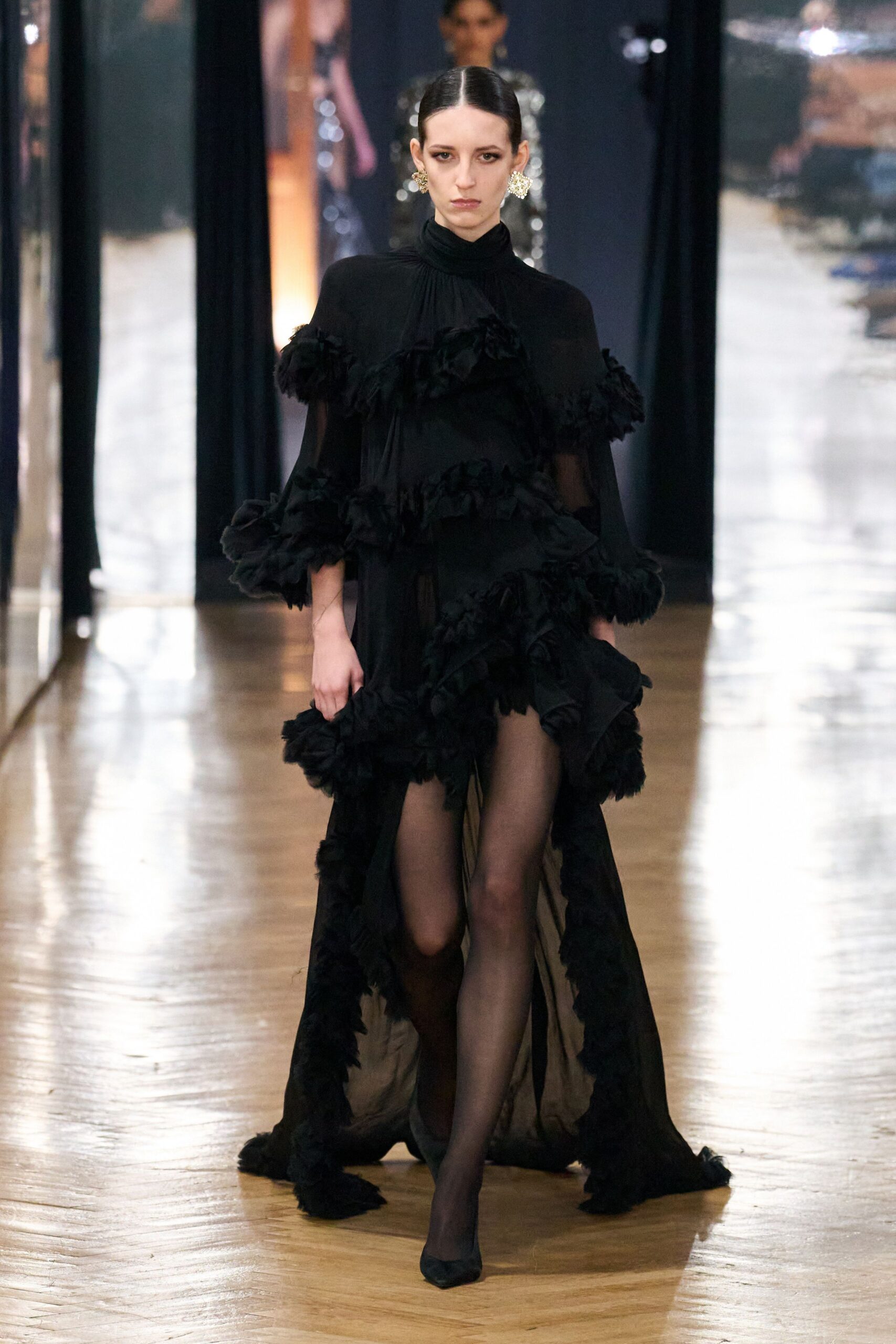 black silk long-sleeve high-neck fitted ruffled layered gown