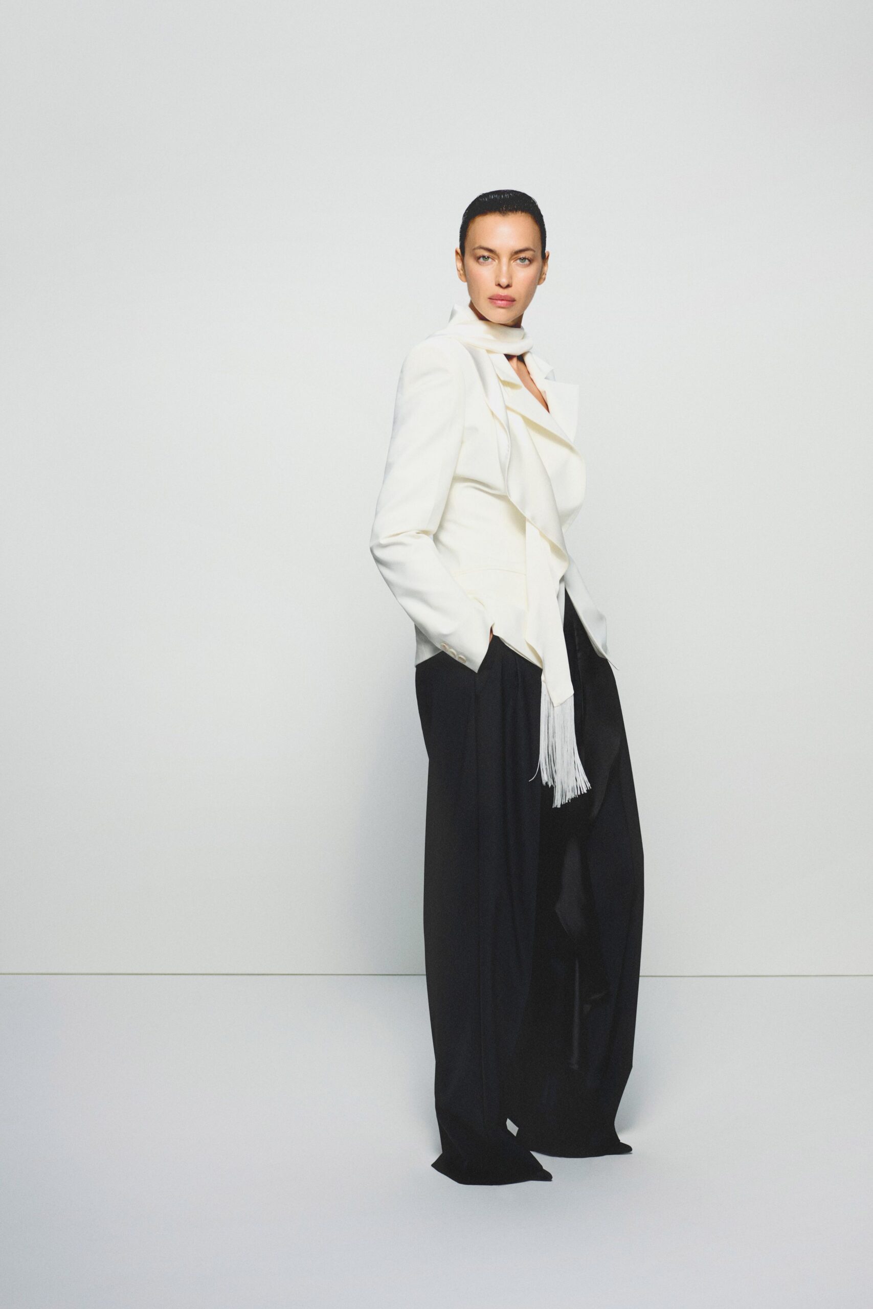 white cotton long-sleeve collared structured draped blazer