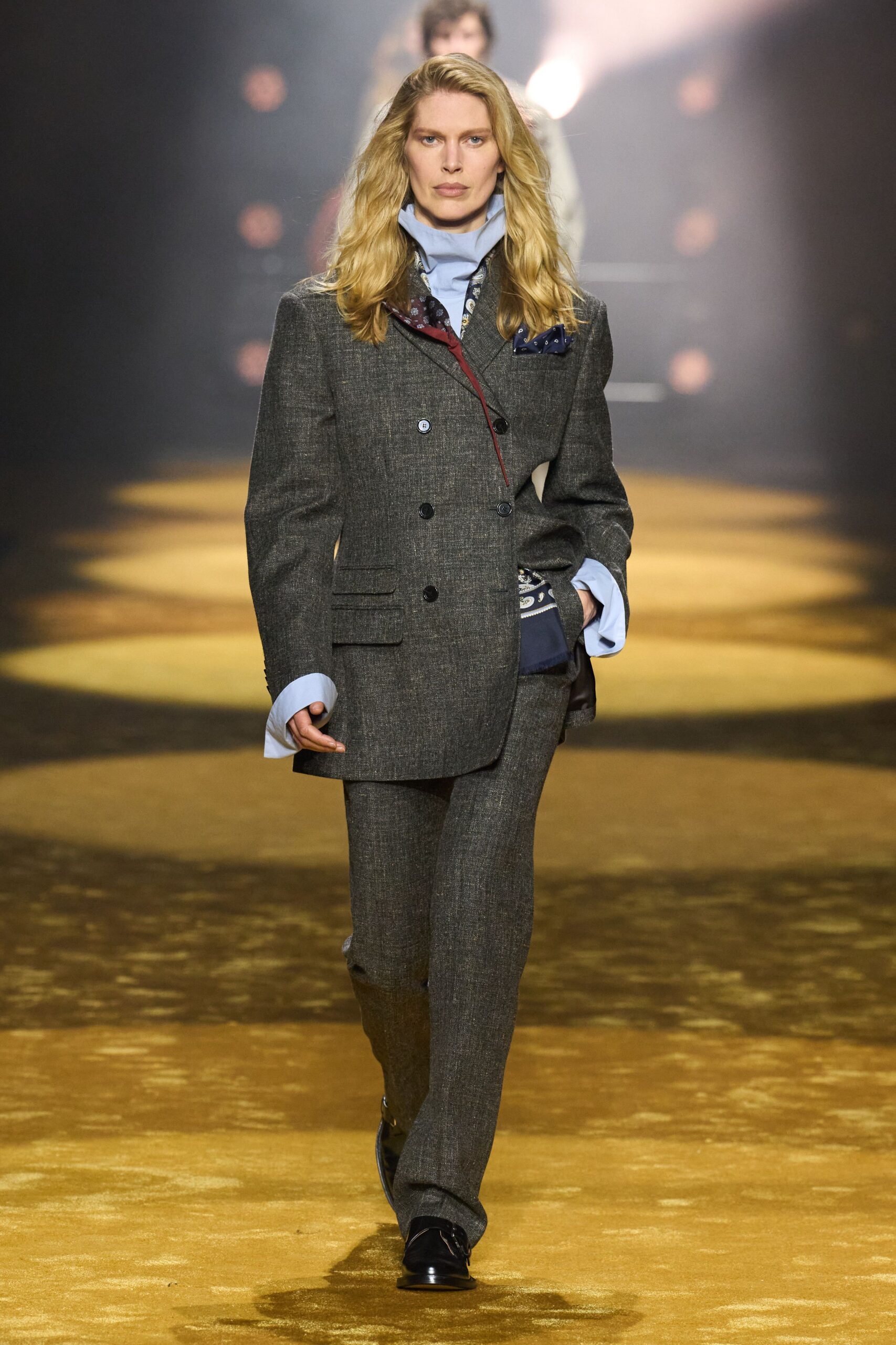 gray tailored suit with blue shirt