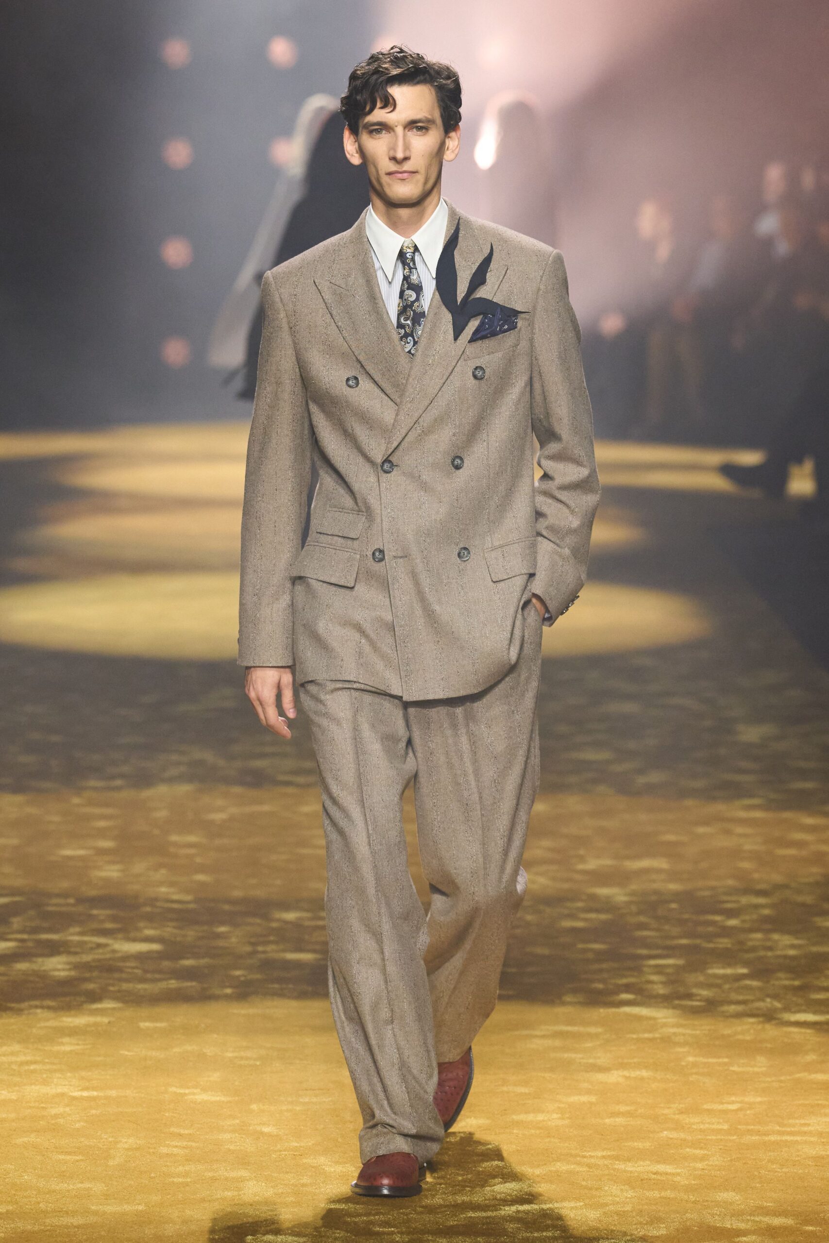 brown tailored suit with white shirt