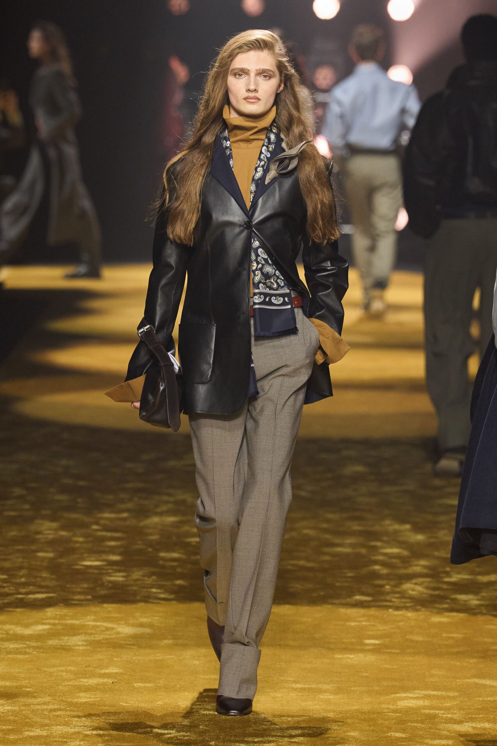 black leather blazer with gray pants