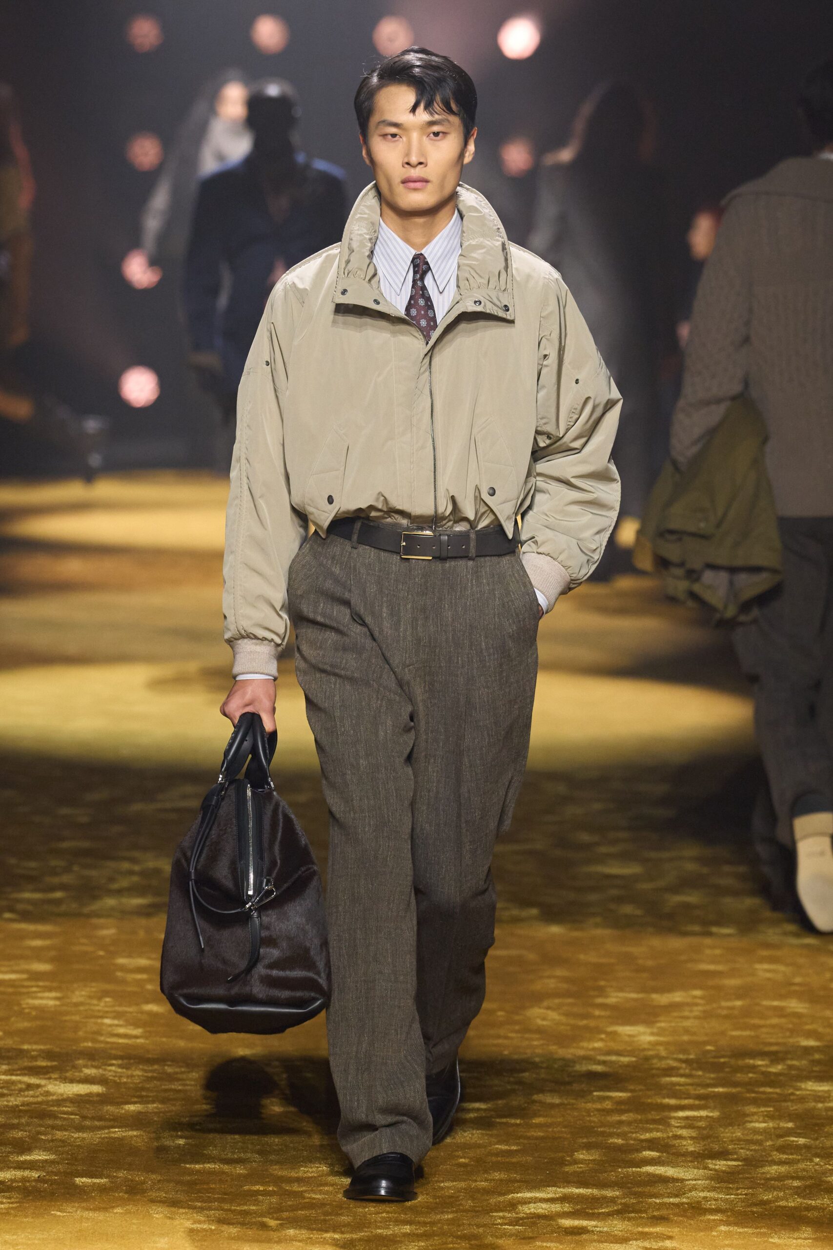 beige relaxed jacket with gray tailored pants