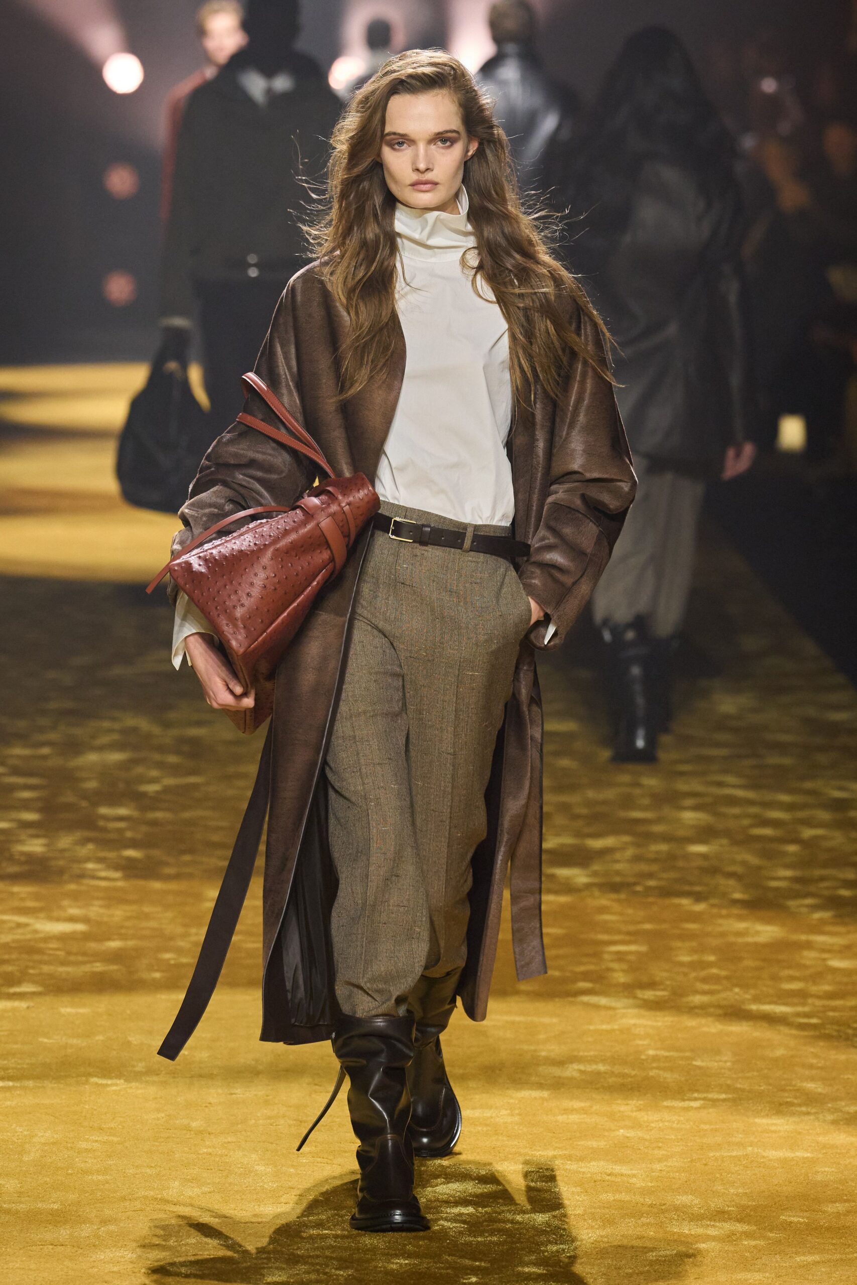 brown leather coat with gray pants