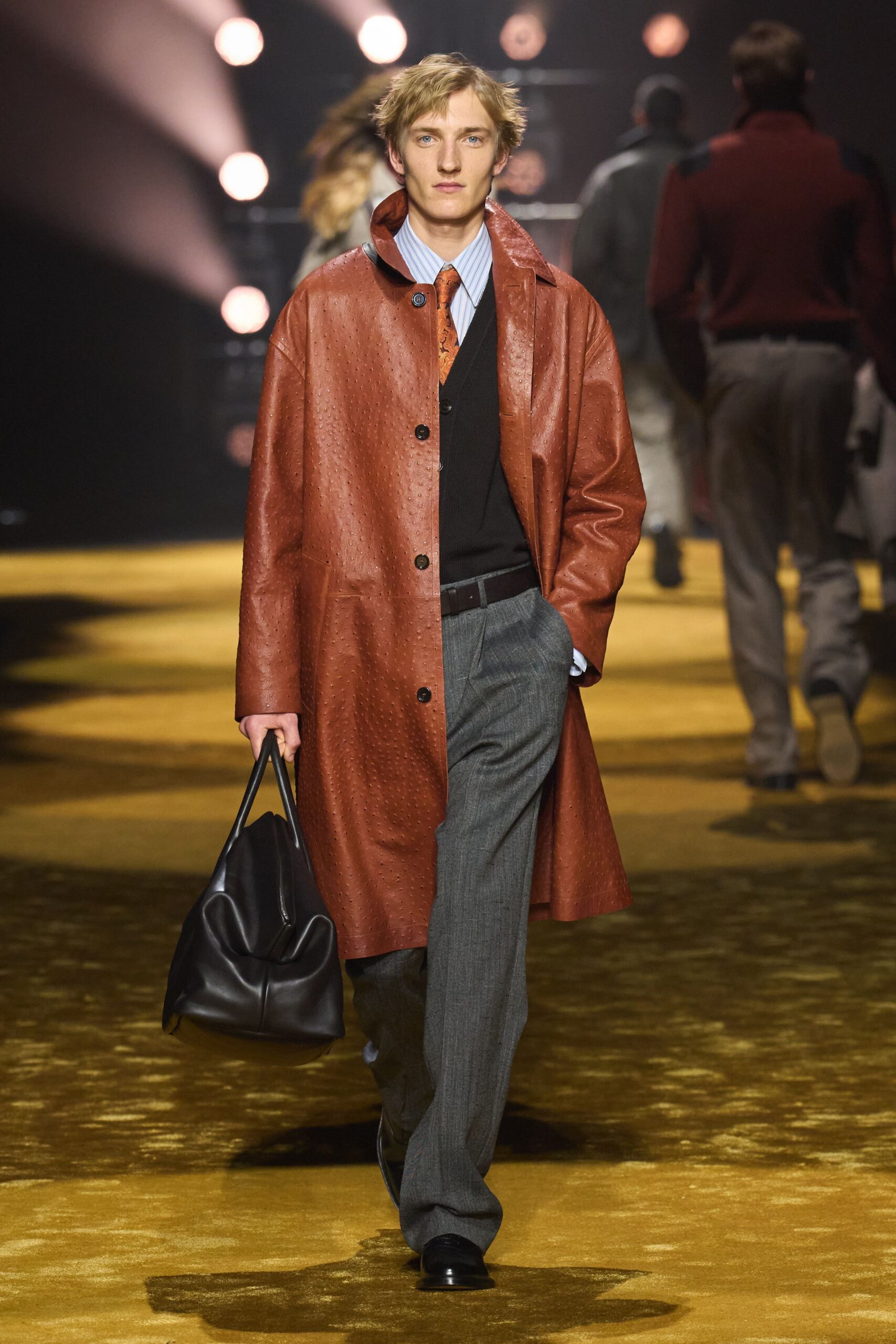 brown leather coat with black sweater
