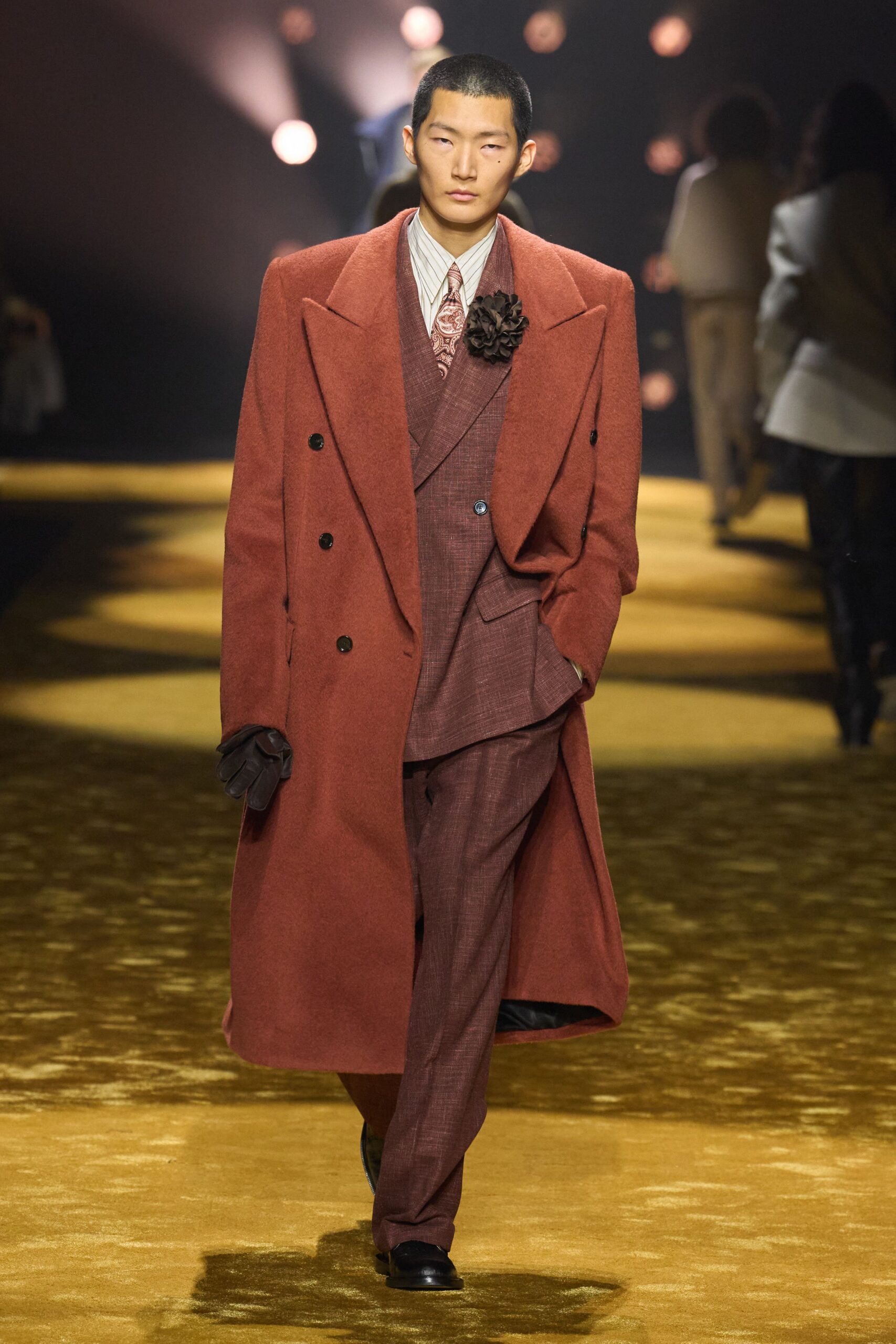 red wool coat with tailored suit