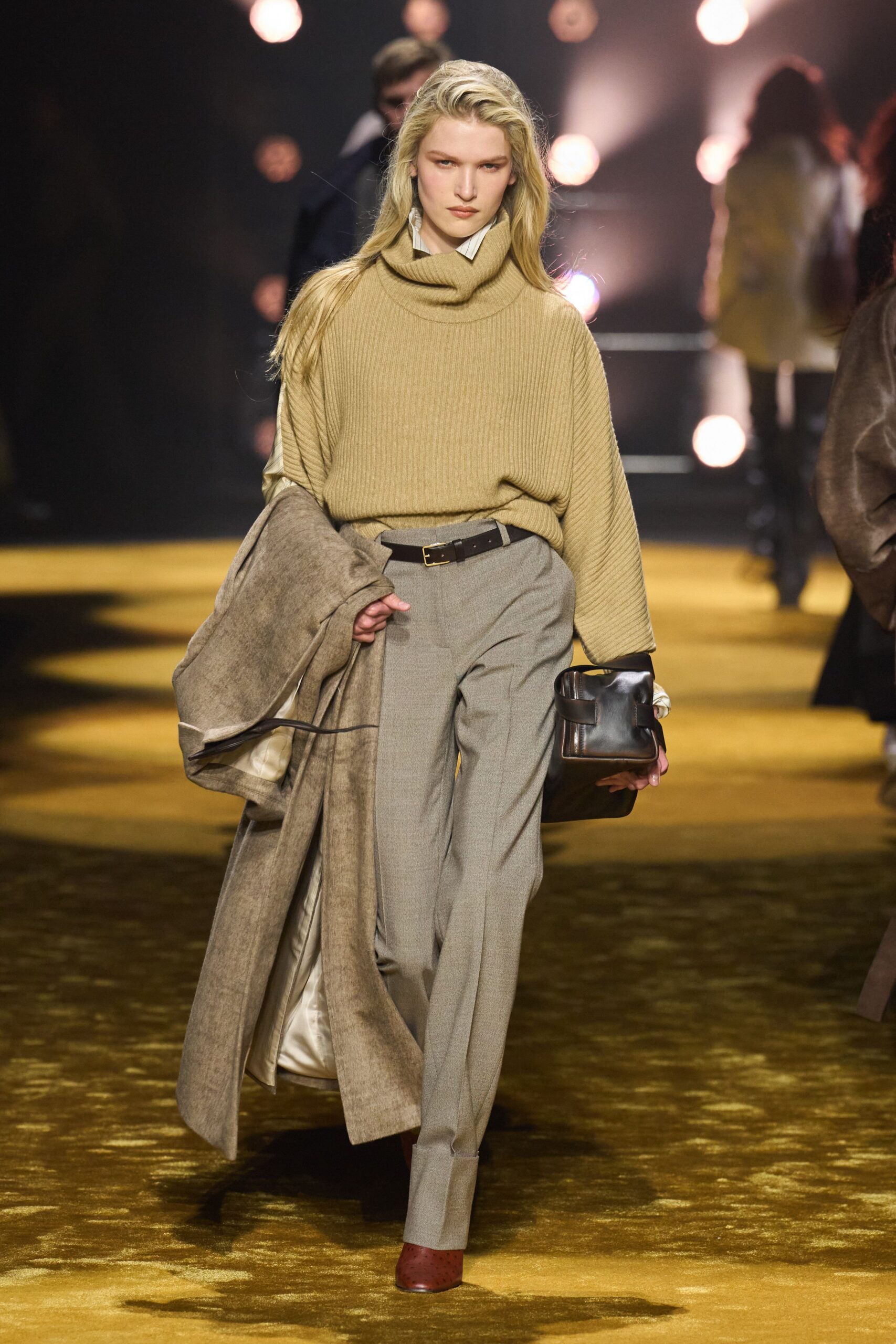 beige wool relaxed sweater with gray tailored pants