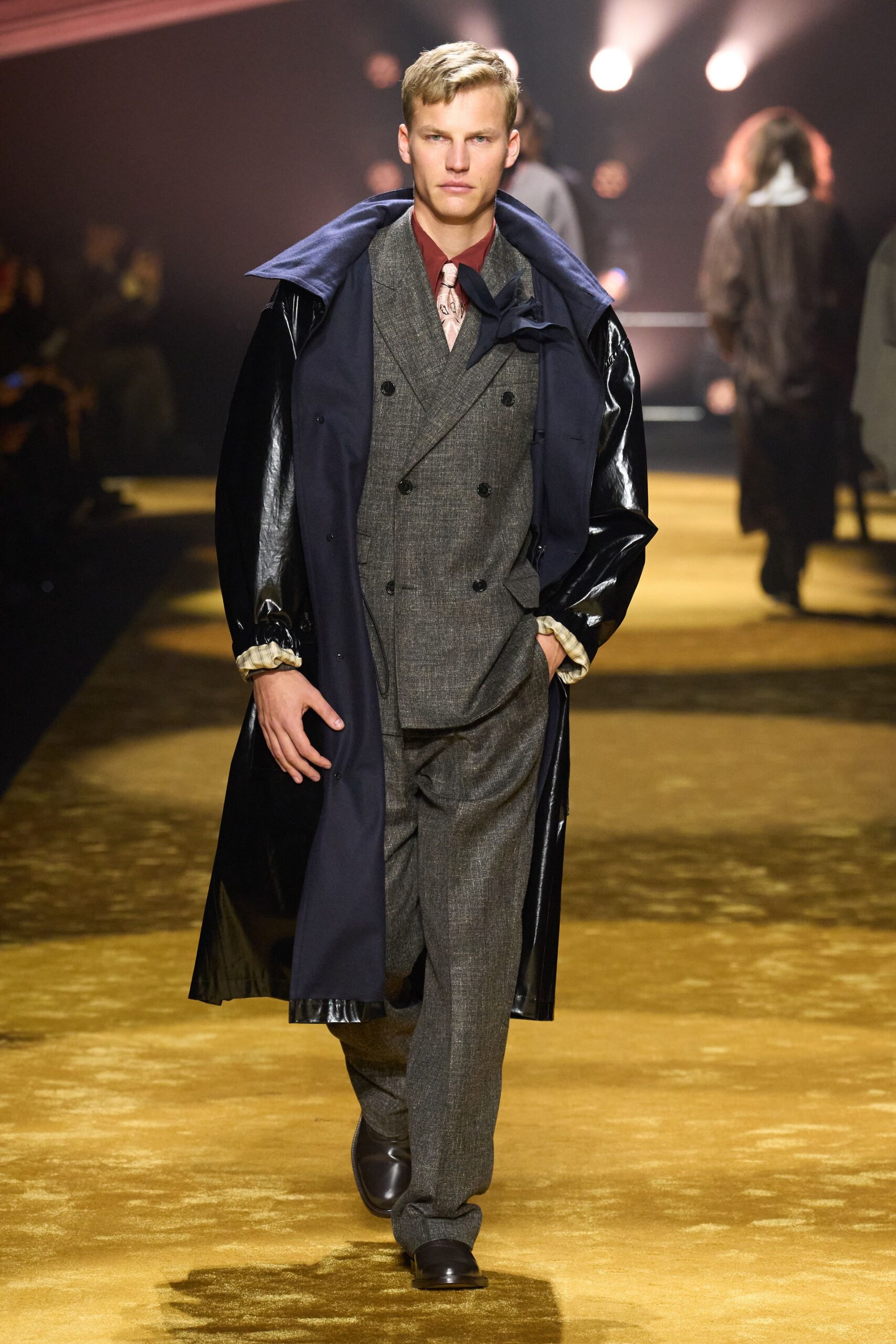 black leather coat gray suit red shirt