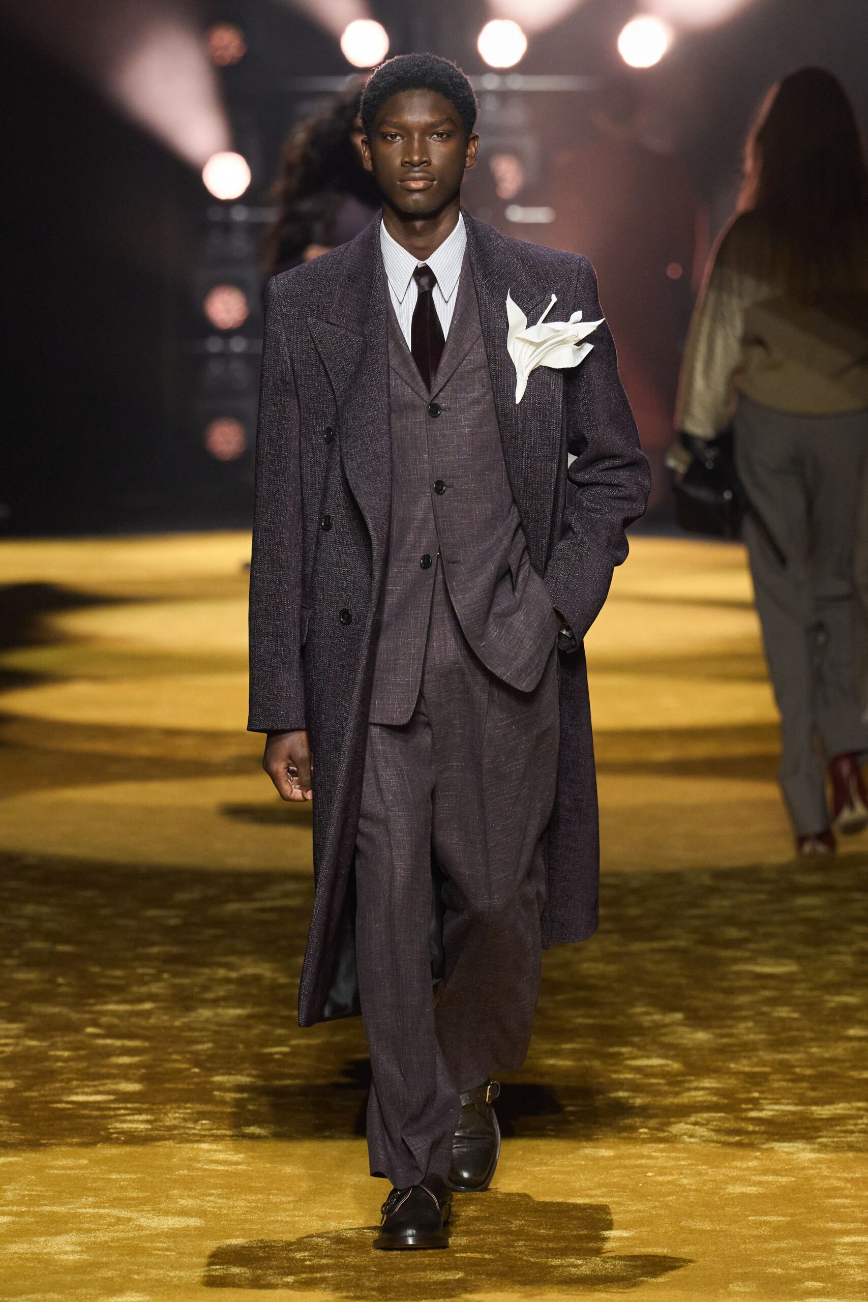 tailored purple suit with white shirt