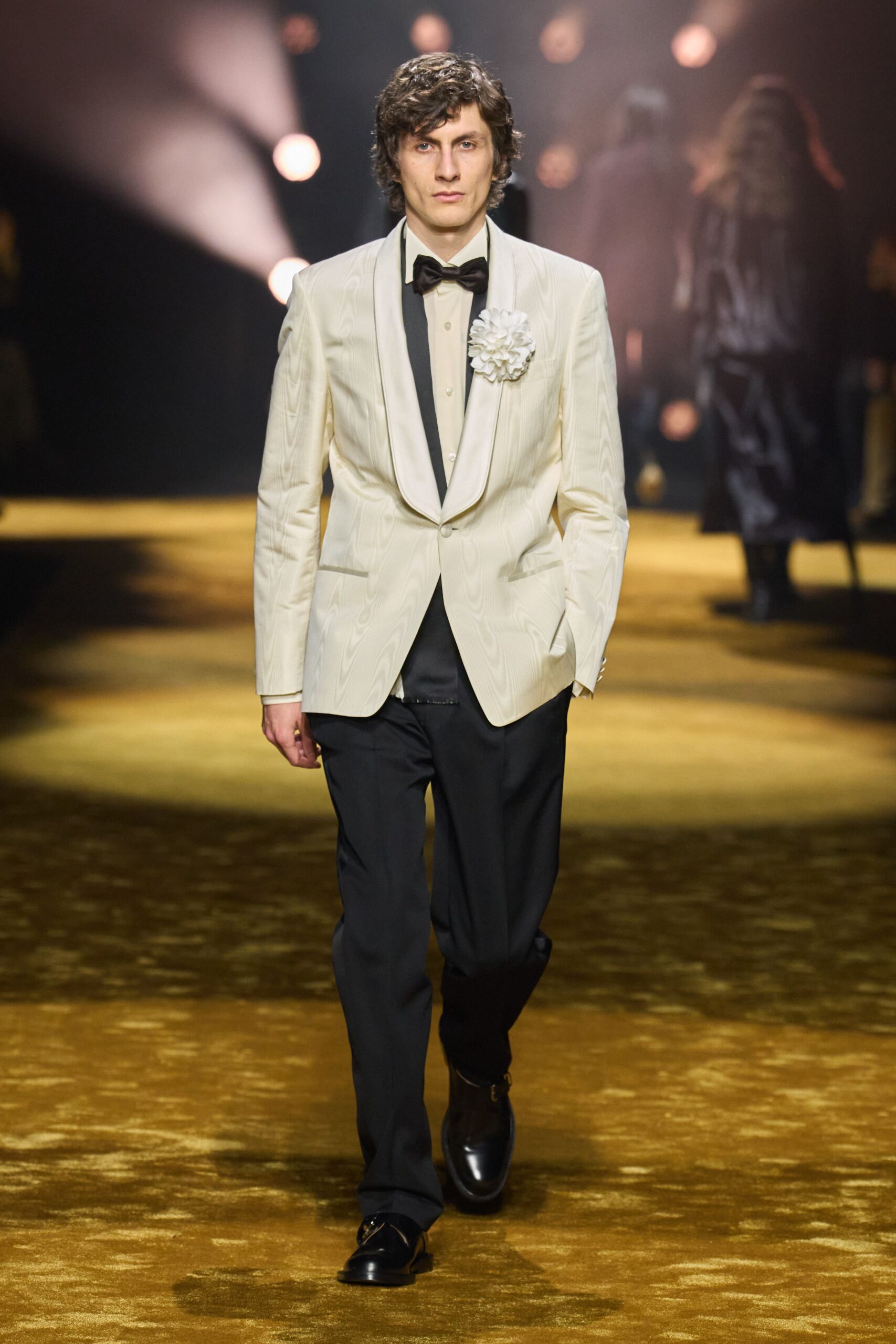 white tailored suit with black pants