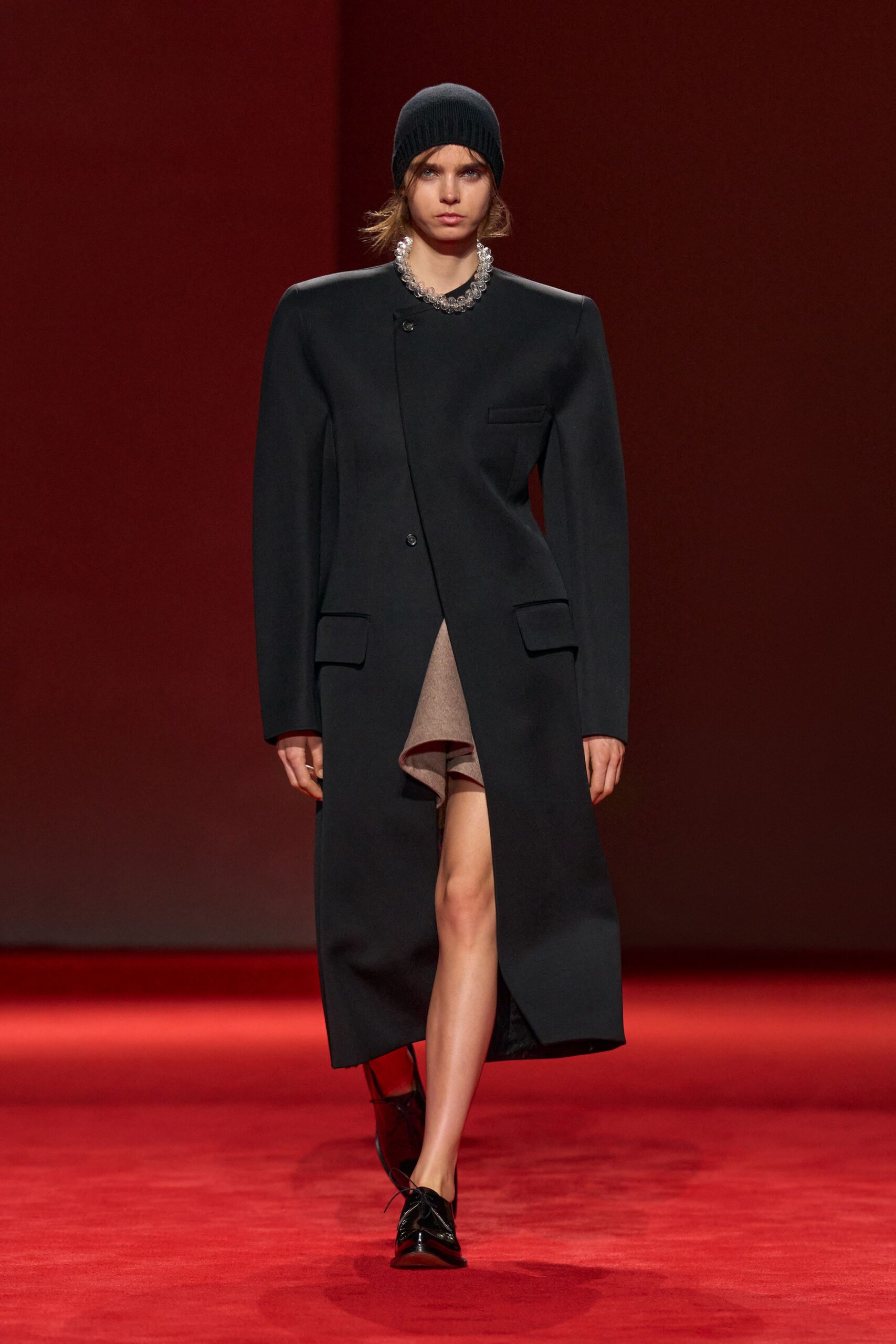 black wool long-sleeve collared structured buttoned coat
