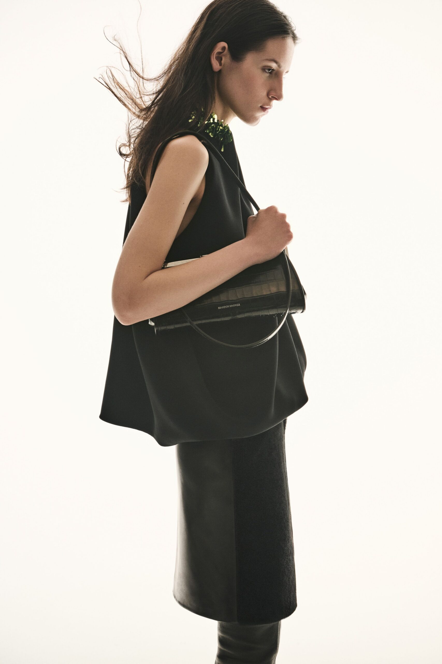 black silk sleeveless high-neck relaxed layered top