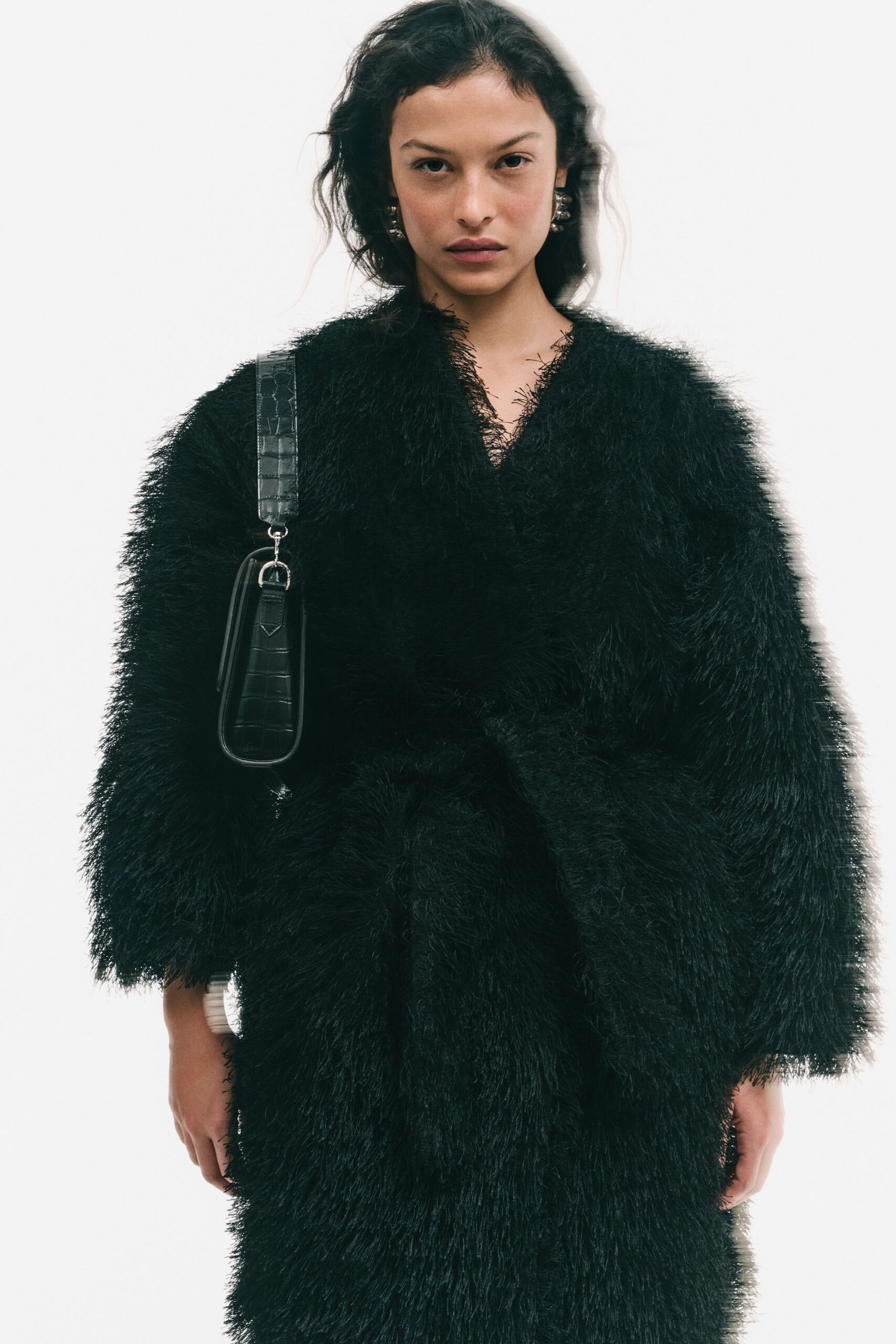 black fur long-sleeve collared relaxed fringed coat