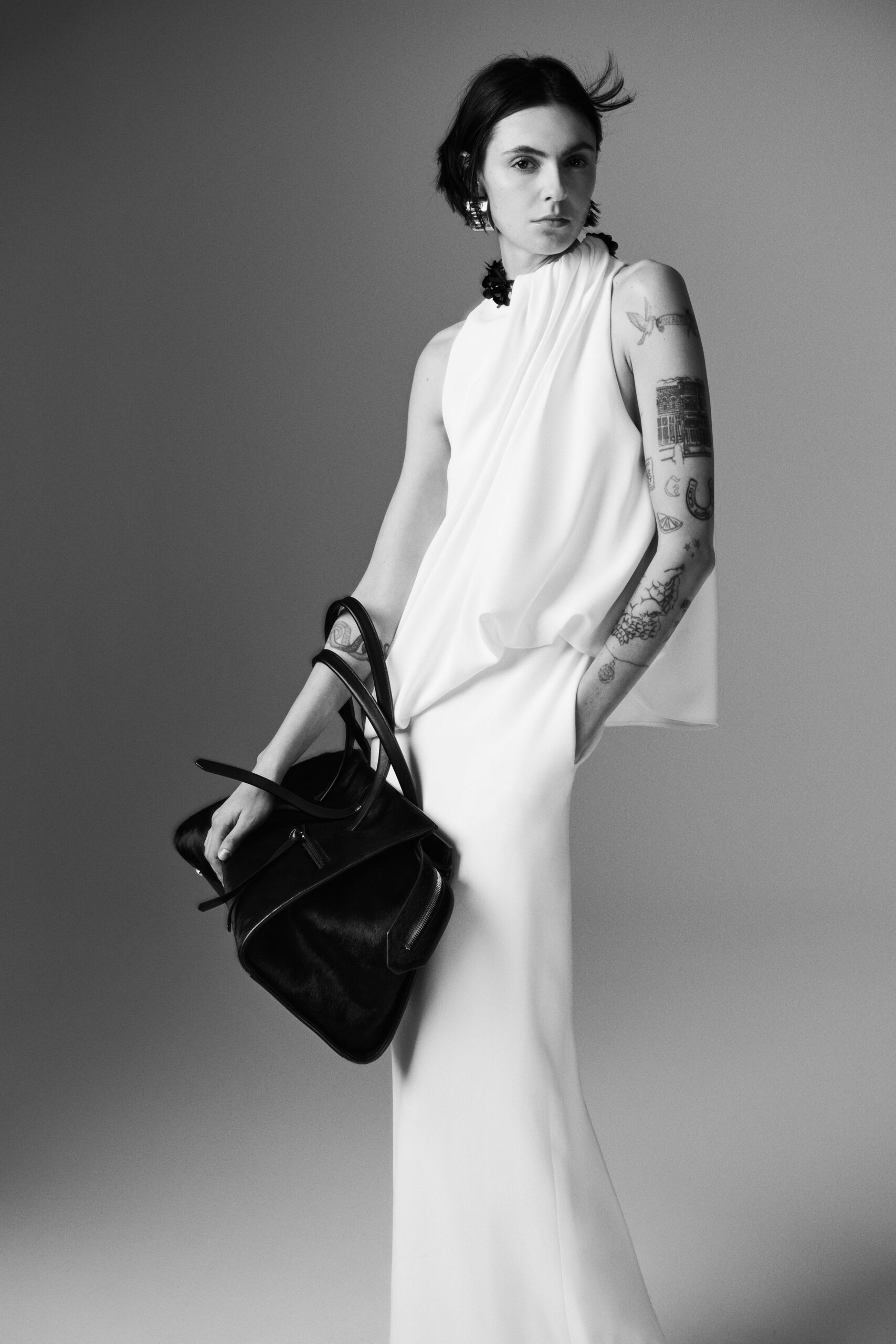 white silk sleeveless high-neck fitted draped maxi gown