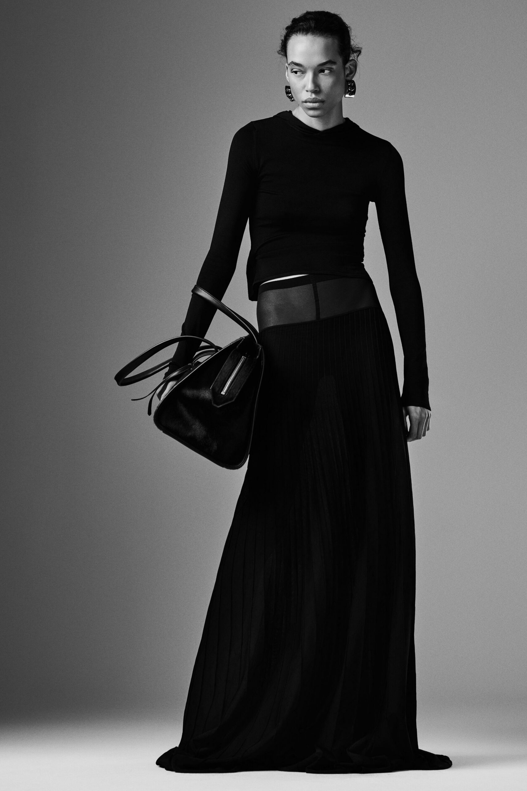 black long-sleeve high-neck fitted top