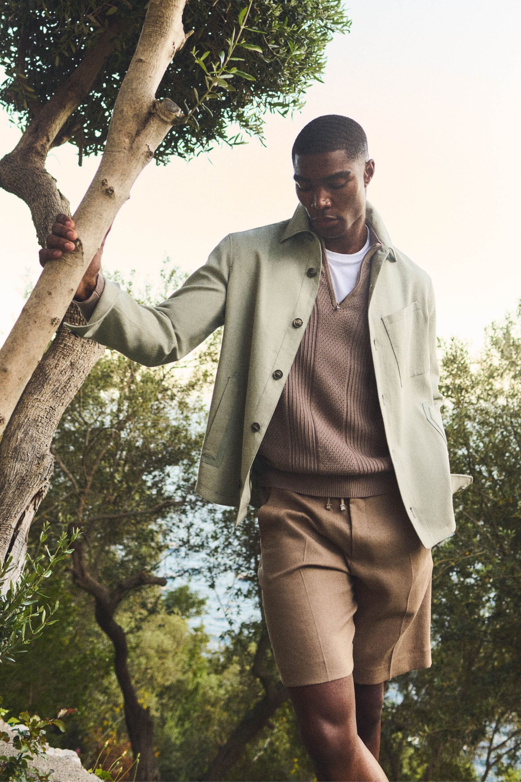 green cotton long-sleeve collared relaxed buttoned jacket