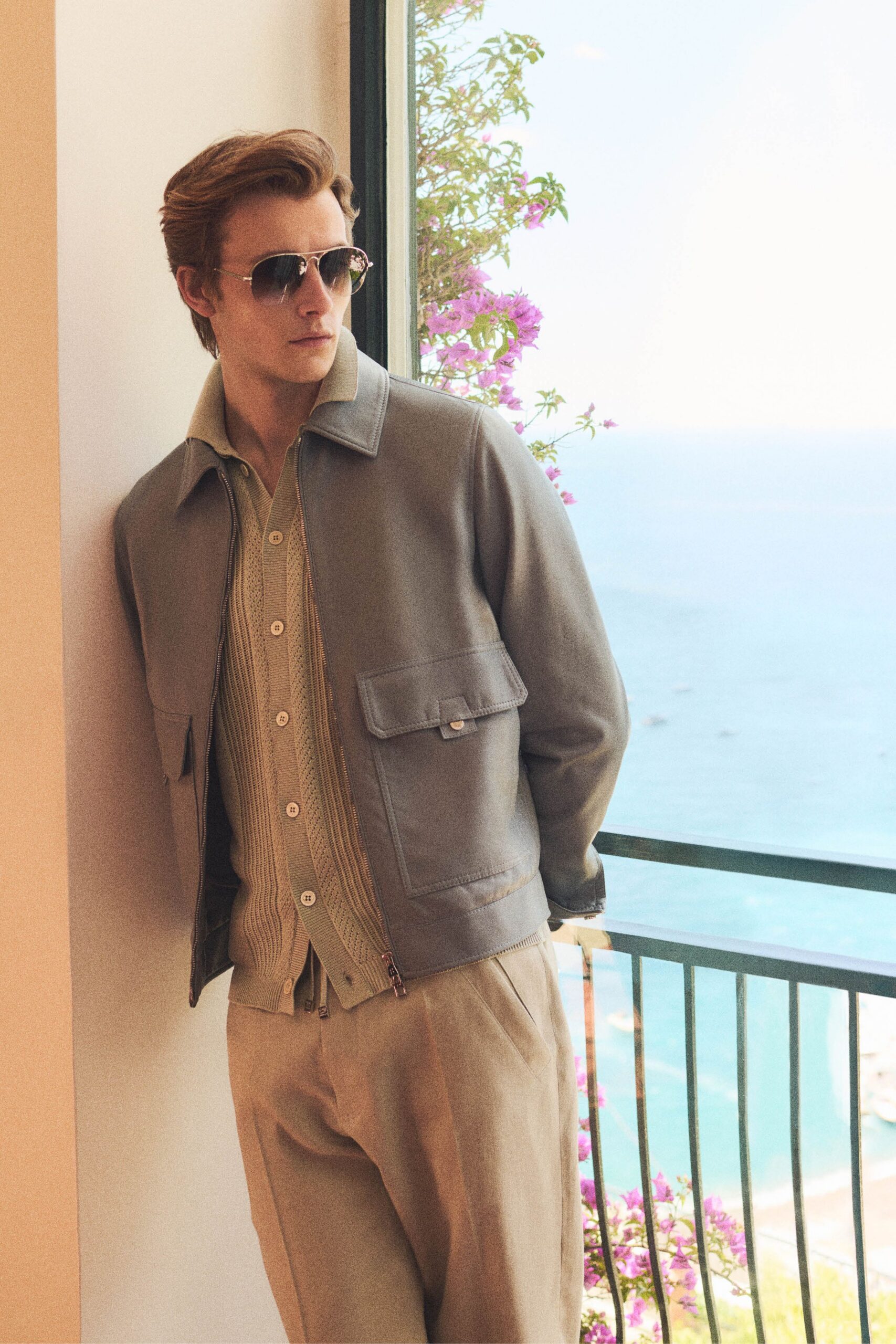 gray leather long-sleeve collared fitted buttoned jacket