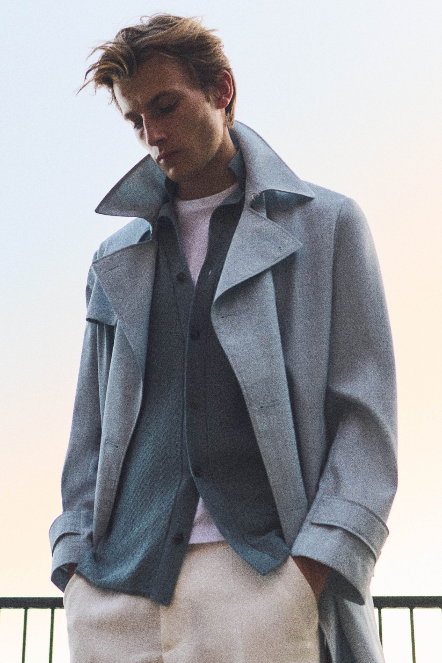 blue cotton long-sleeve collared relaxed buttoned coat