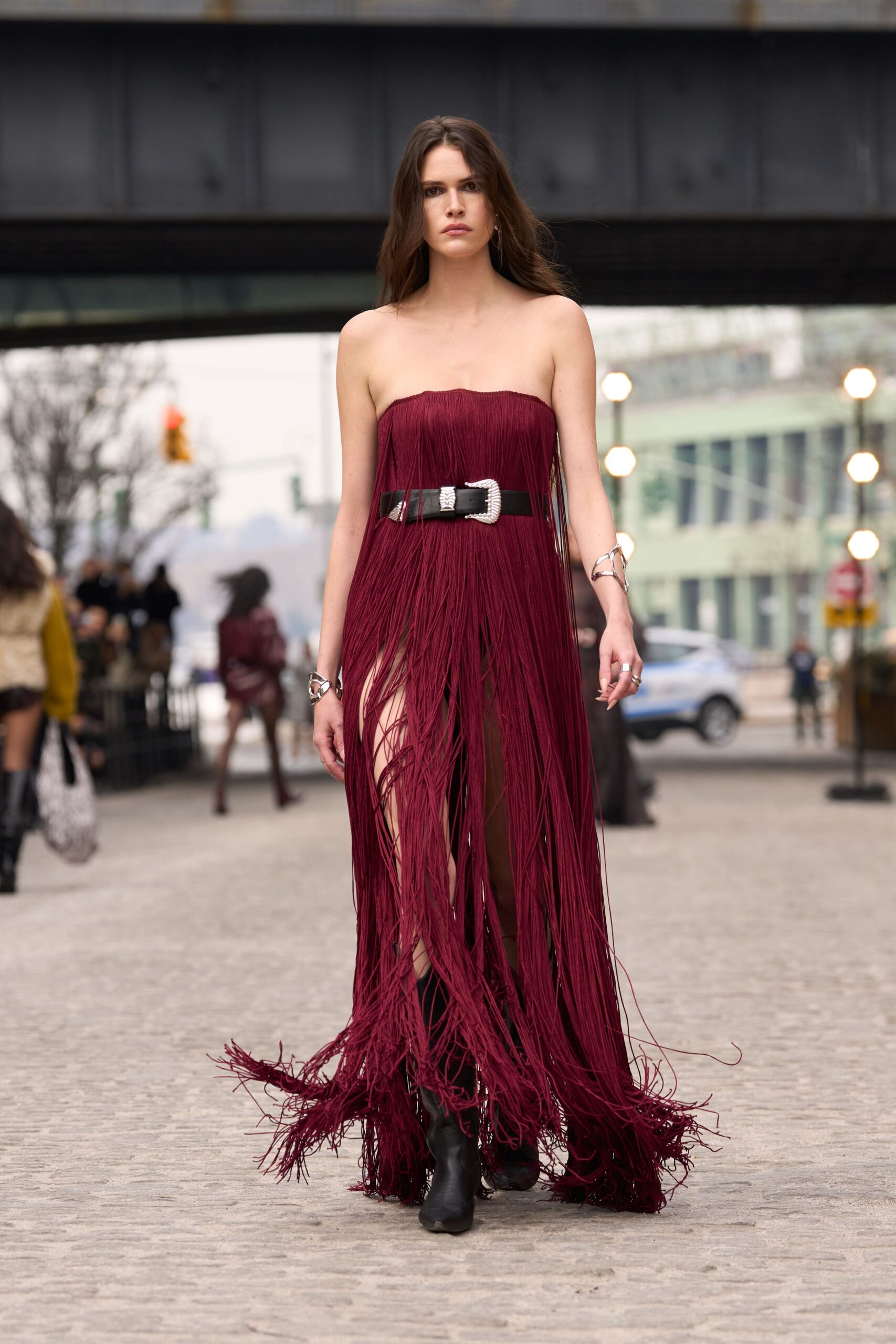red silk strapless slit fitted fringed maxi gown