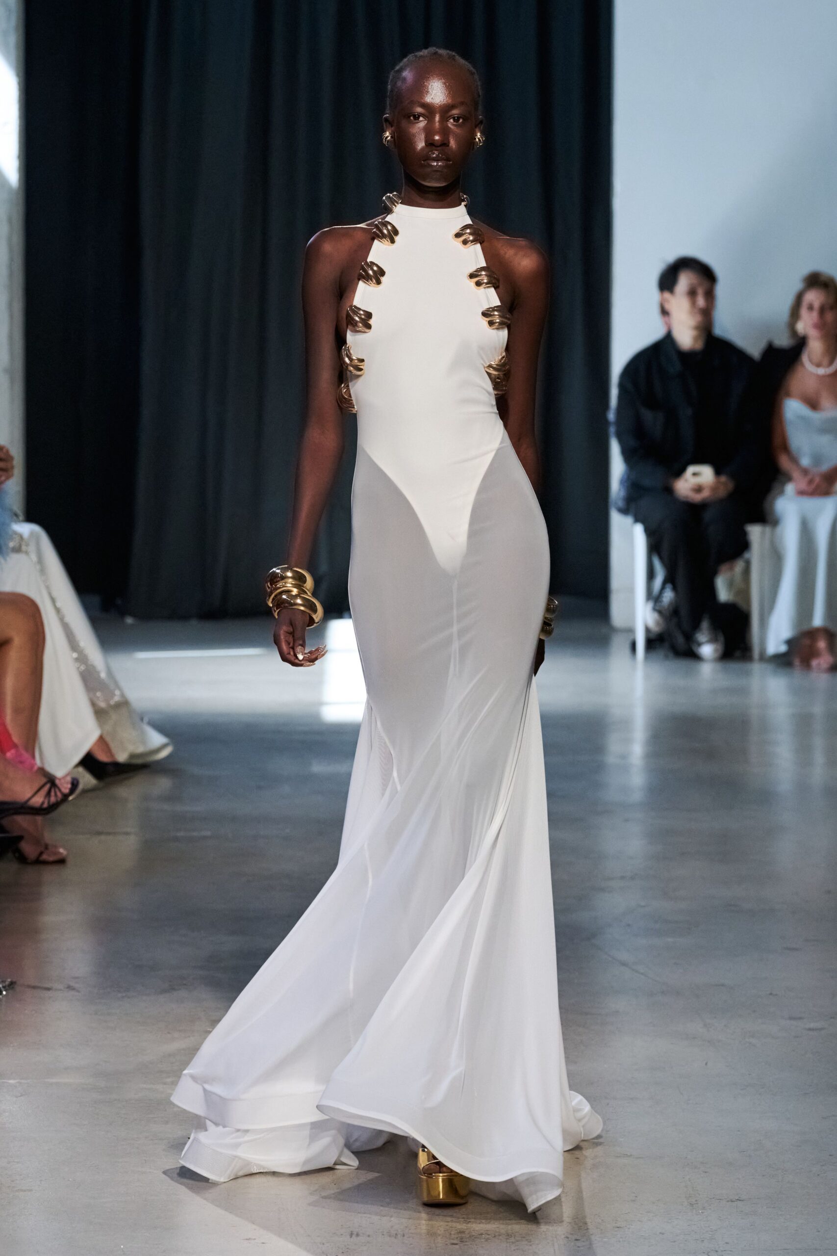 white silk sleeveless high-neck fitted draped flowing gown