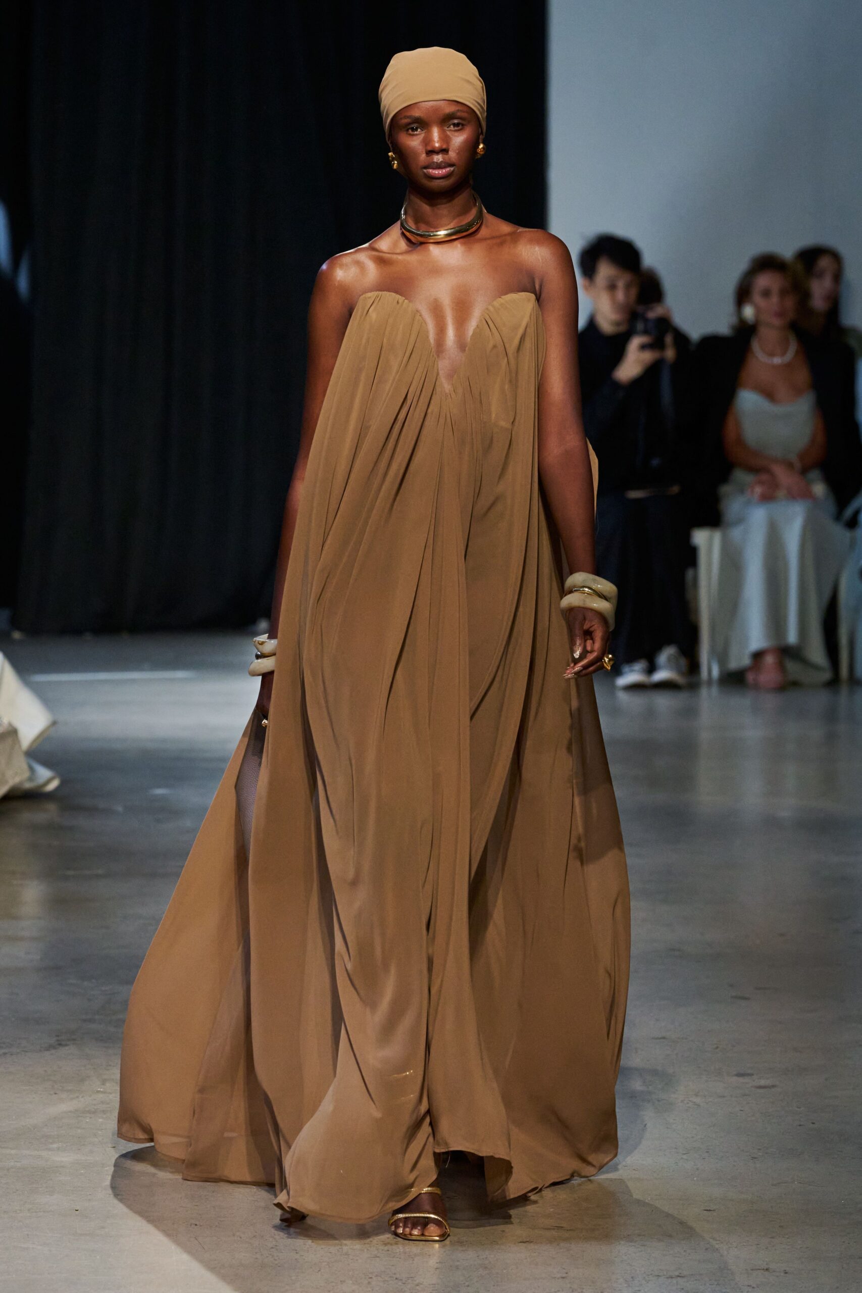 brown chiffon sleeveless low-cut relaxed draped flowing gown