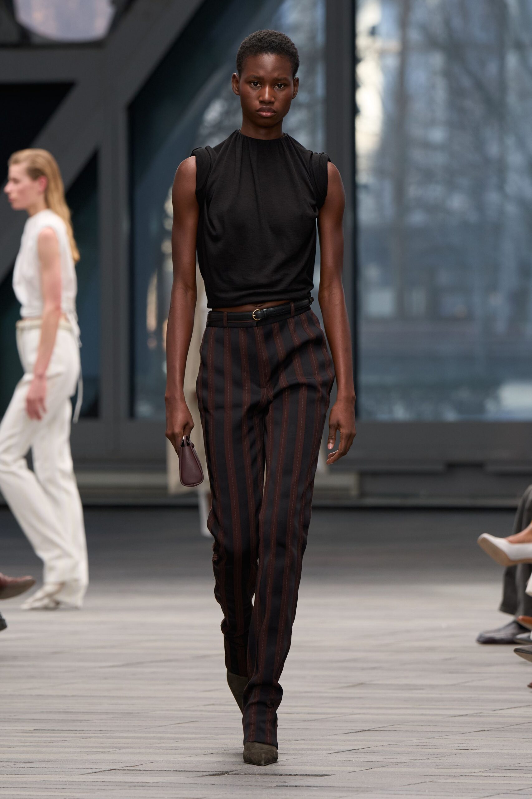 black fitted top with tailored pants