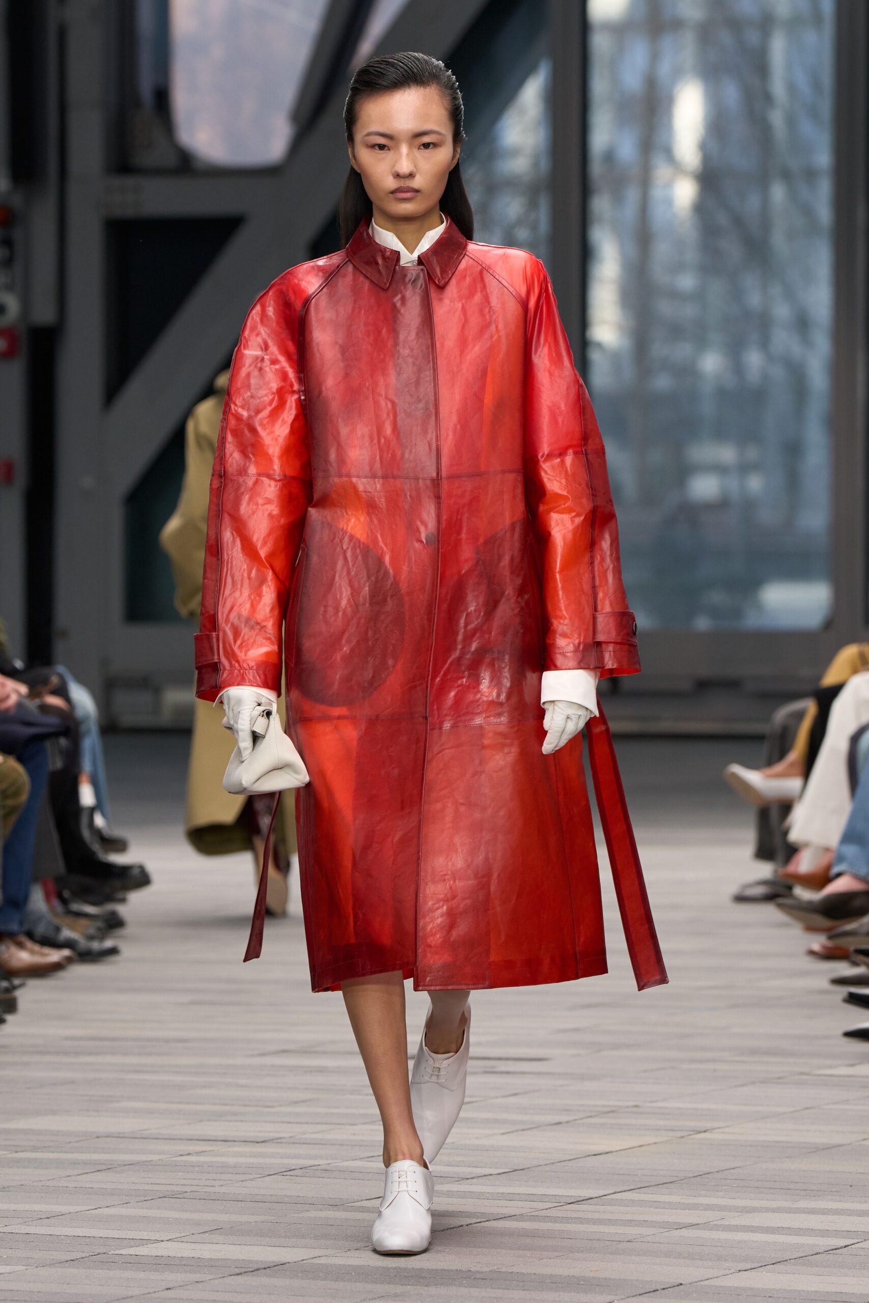 red leather coat with white accessories