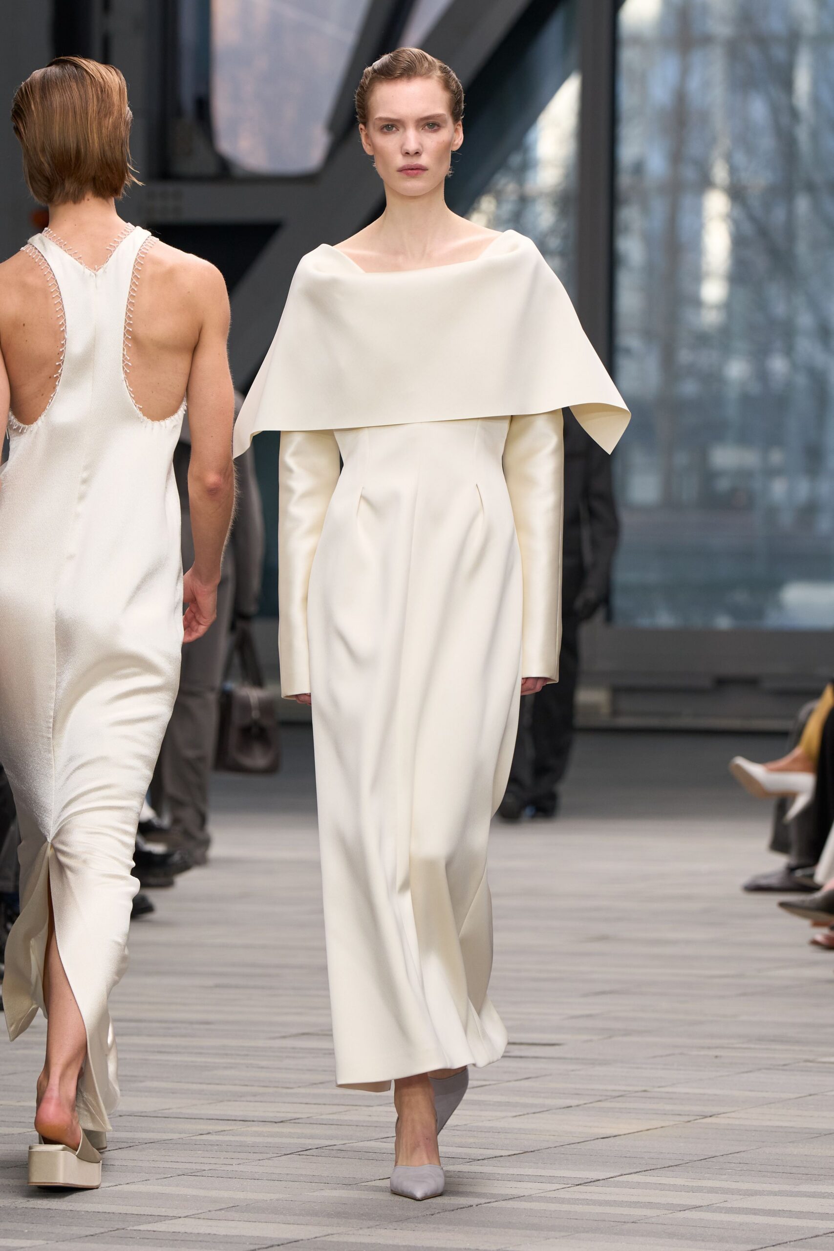 white silk sleeveless backless fitted maxi gown