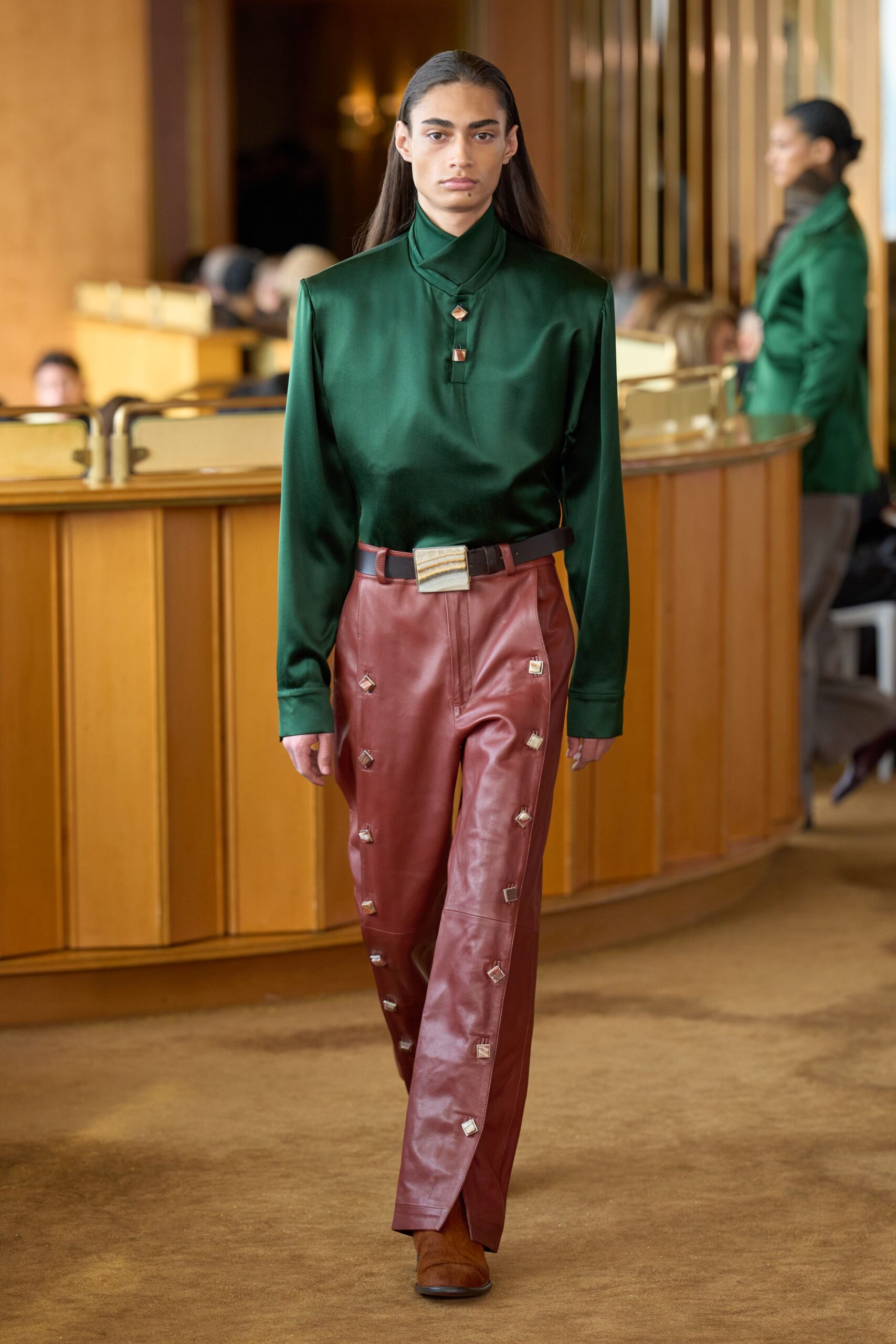 green silk shirt with red leather pants