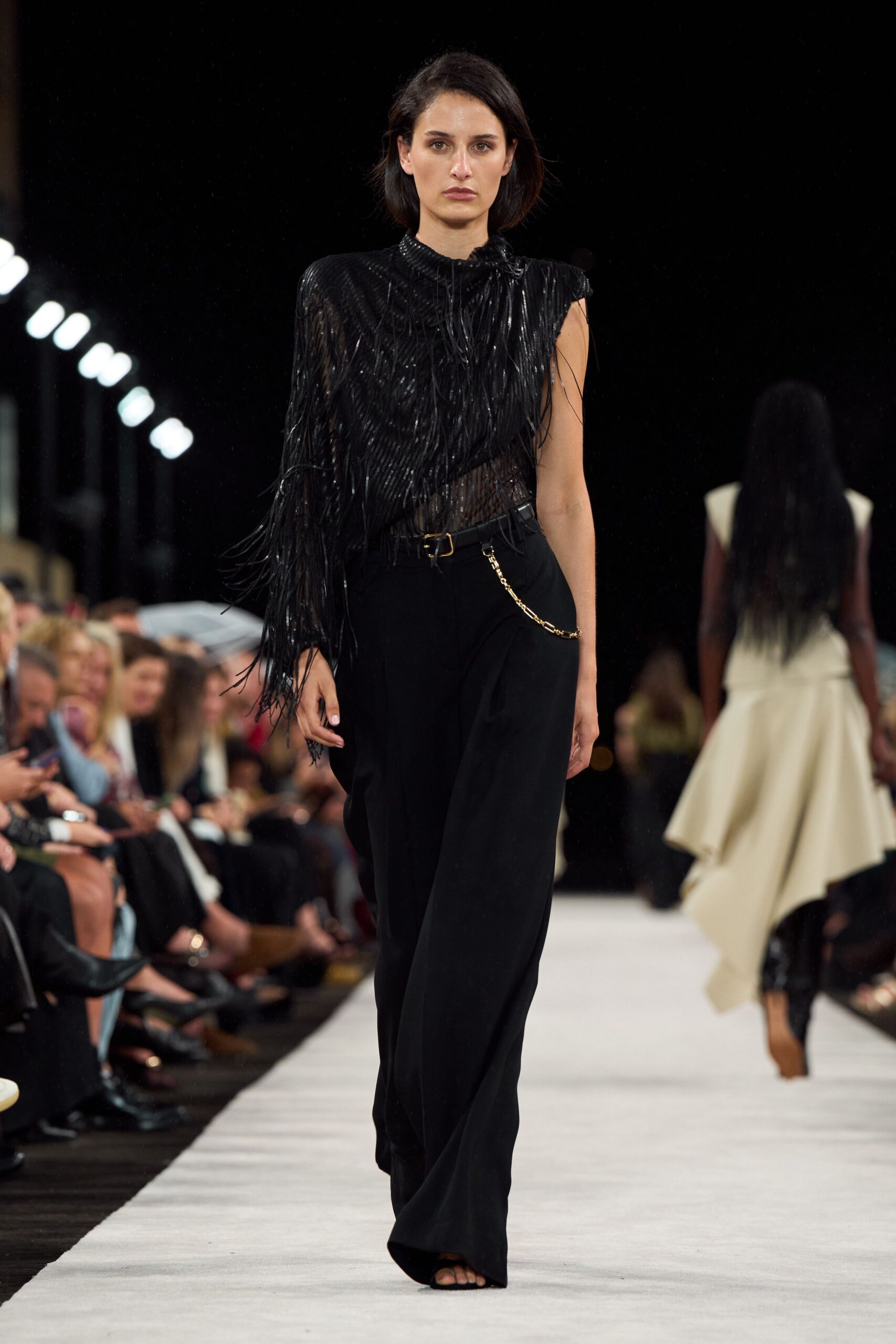 black silk sleeveless high-neck fitted fringed top