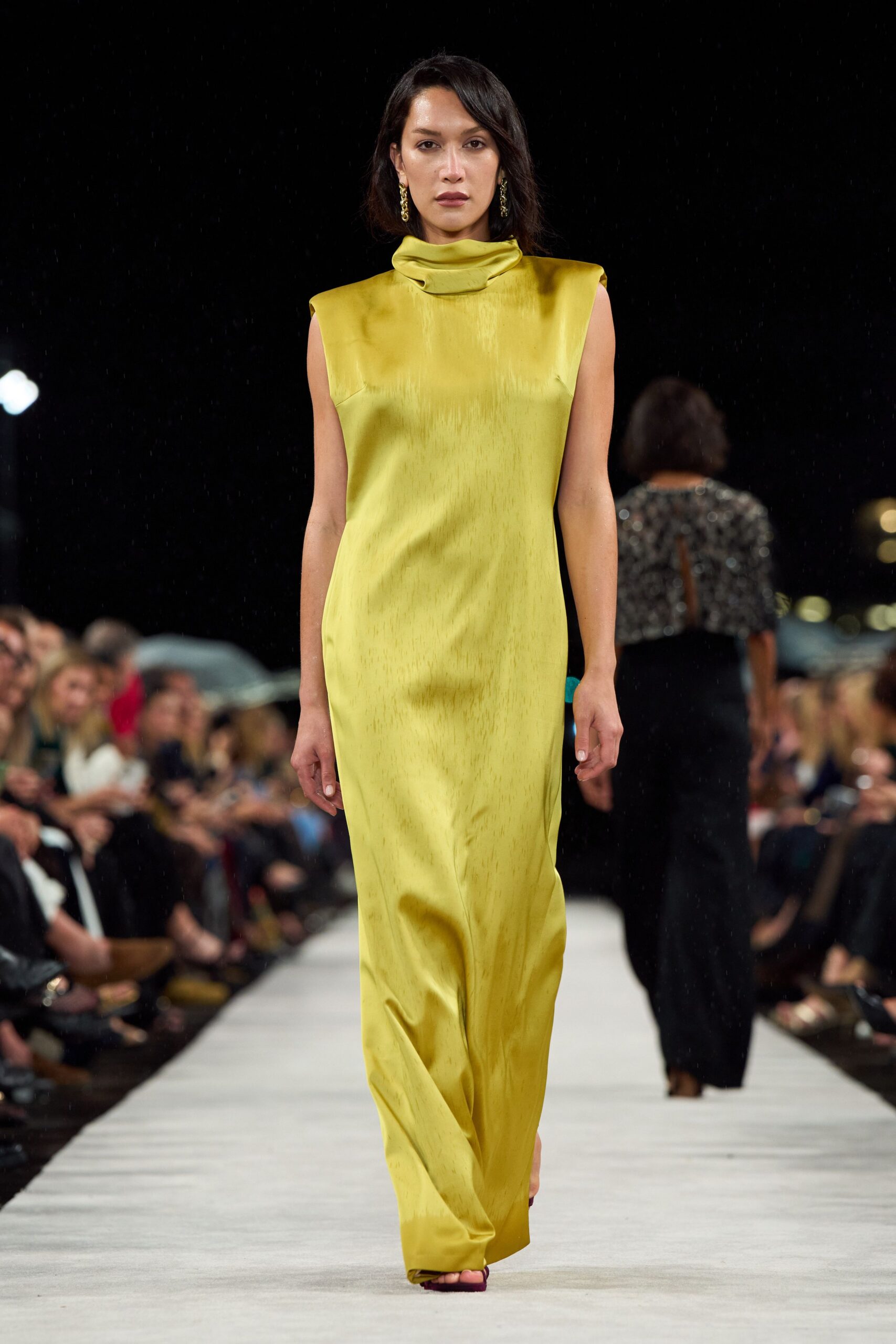 yellow silk sleeveless high-neck fitted flowing maxi gown