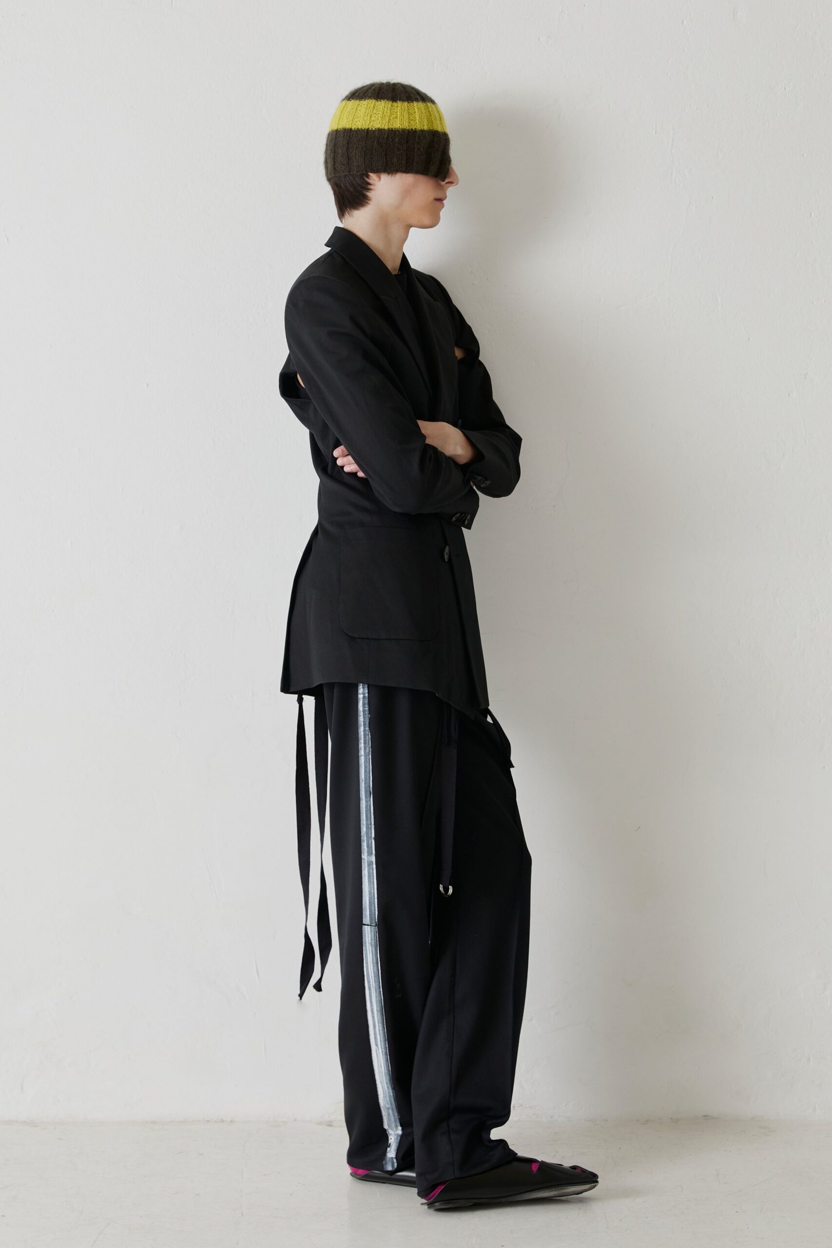 black tailored blazer and relaxed pants