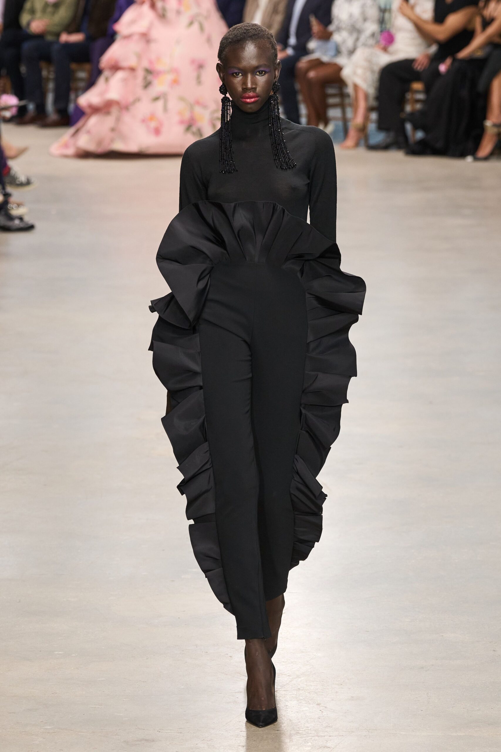 black fitted jumpsuit with ruffles