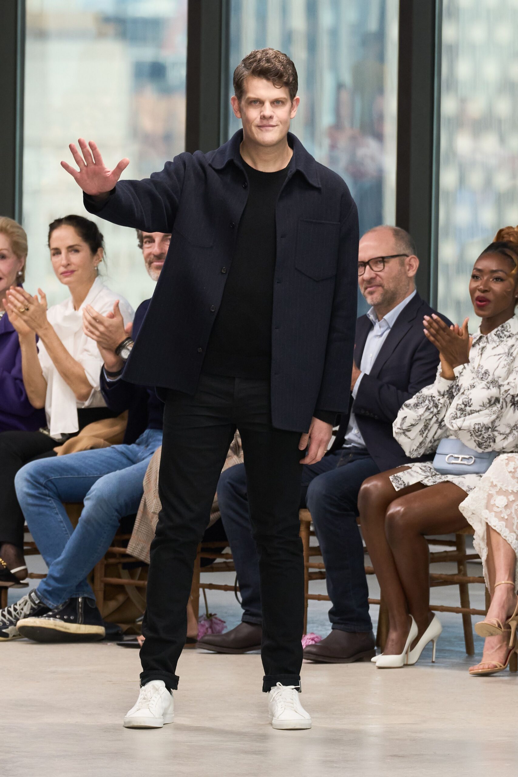 black relaxed jacket with white shoes