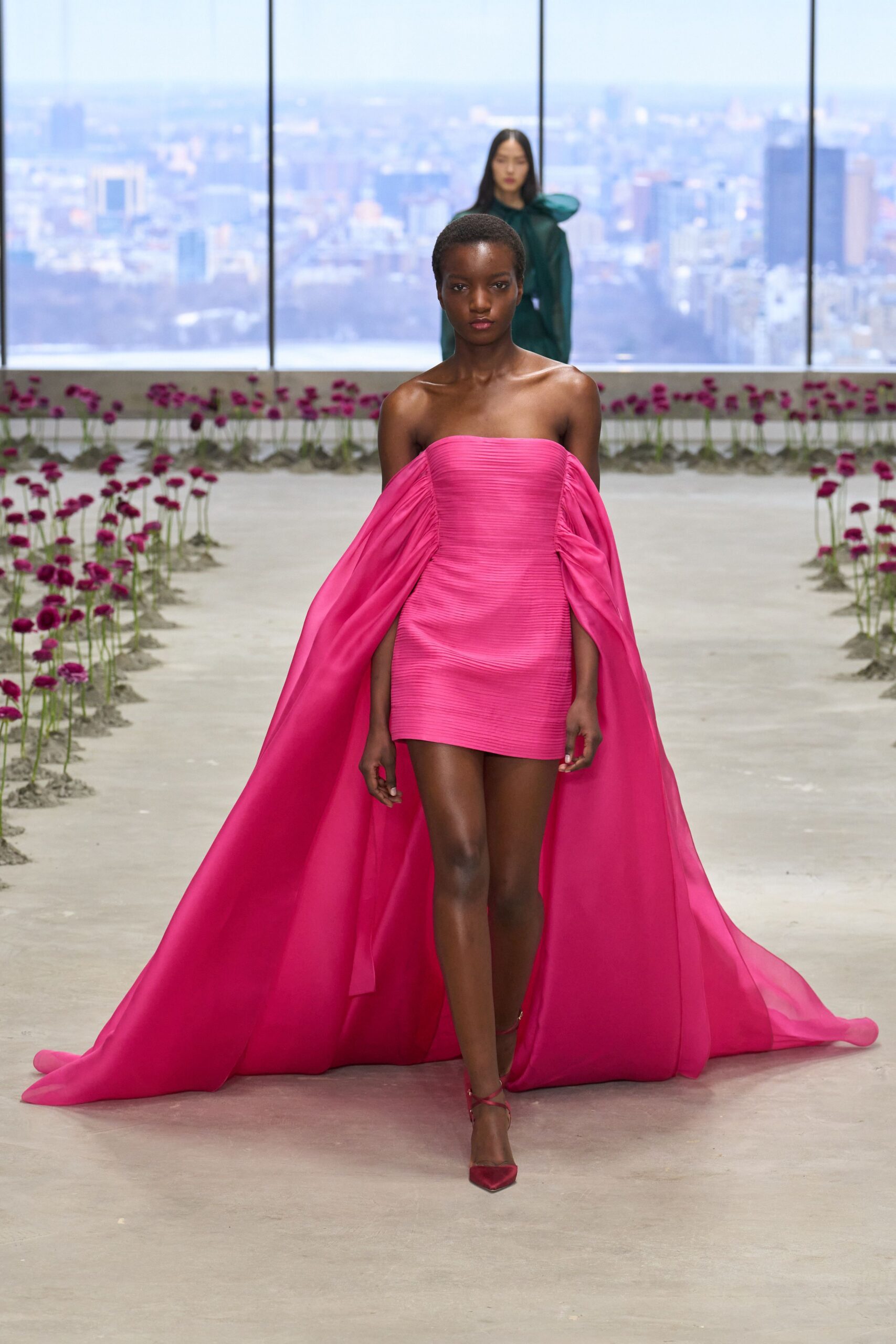 pink silk strapless fitted pleated draped flowing dress