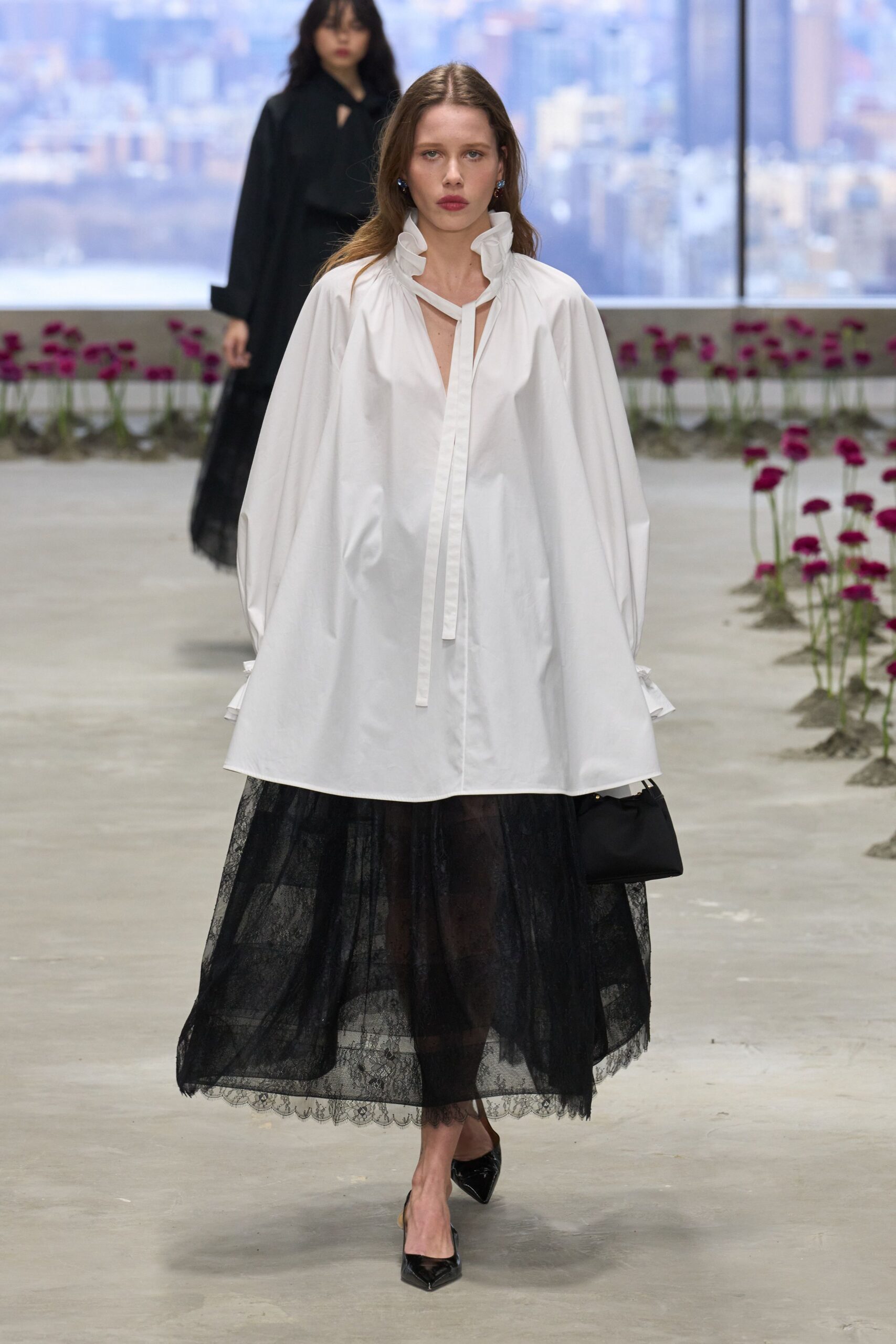 white cotton long-sleeve collared oversized buttoned shirt