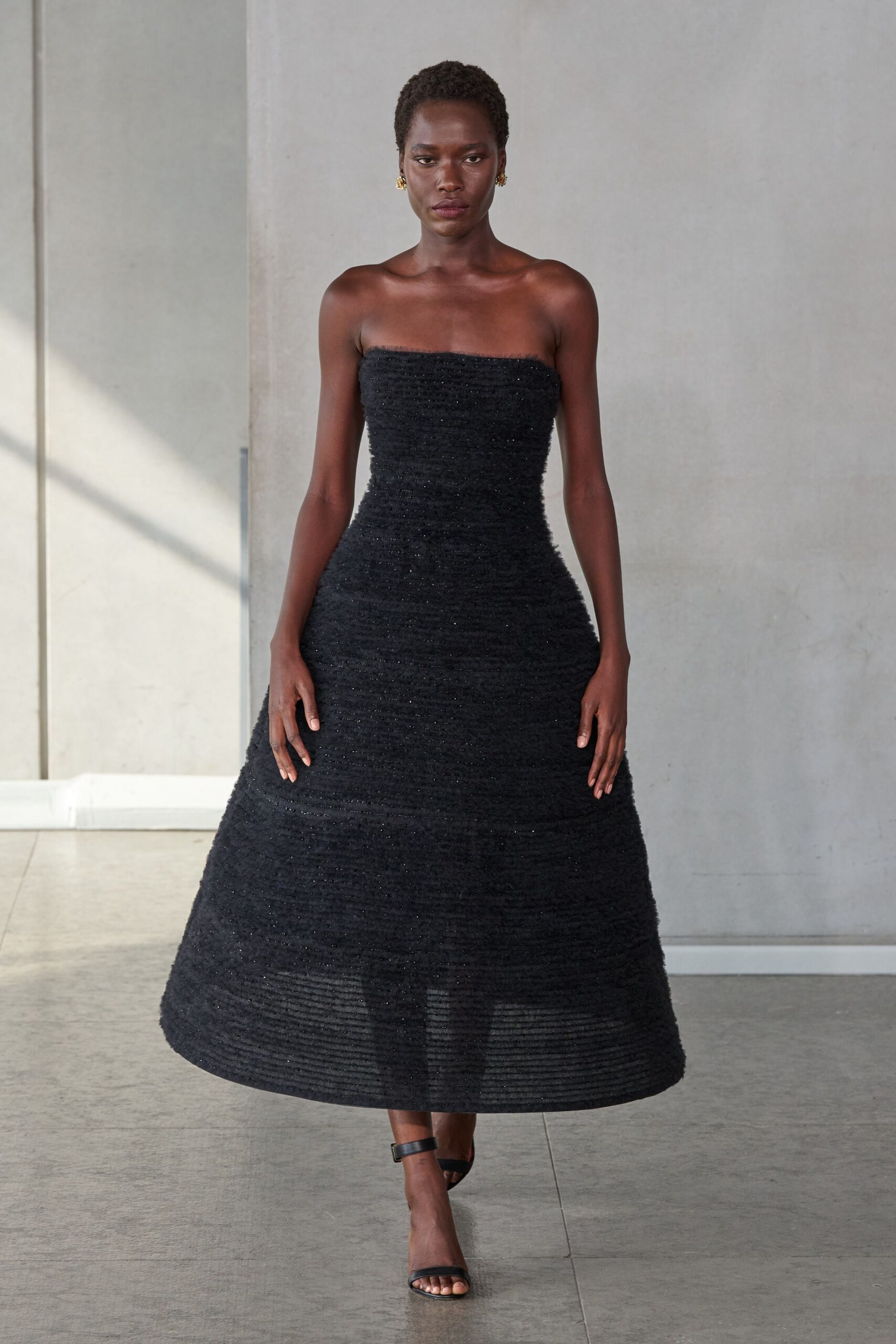 black cotton strapless fitted tiered maxi gown