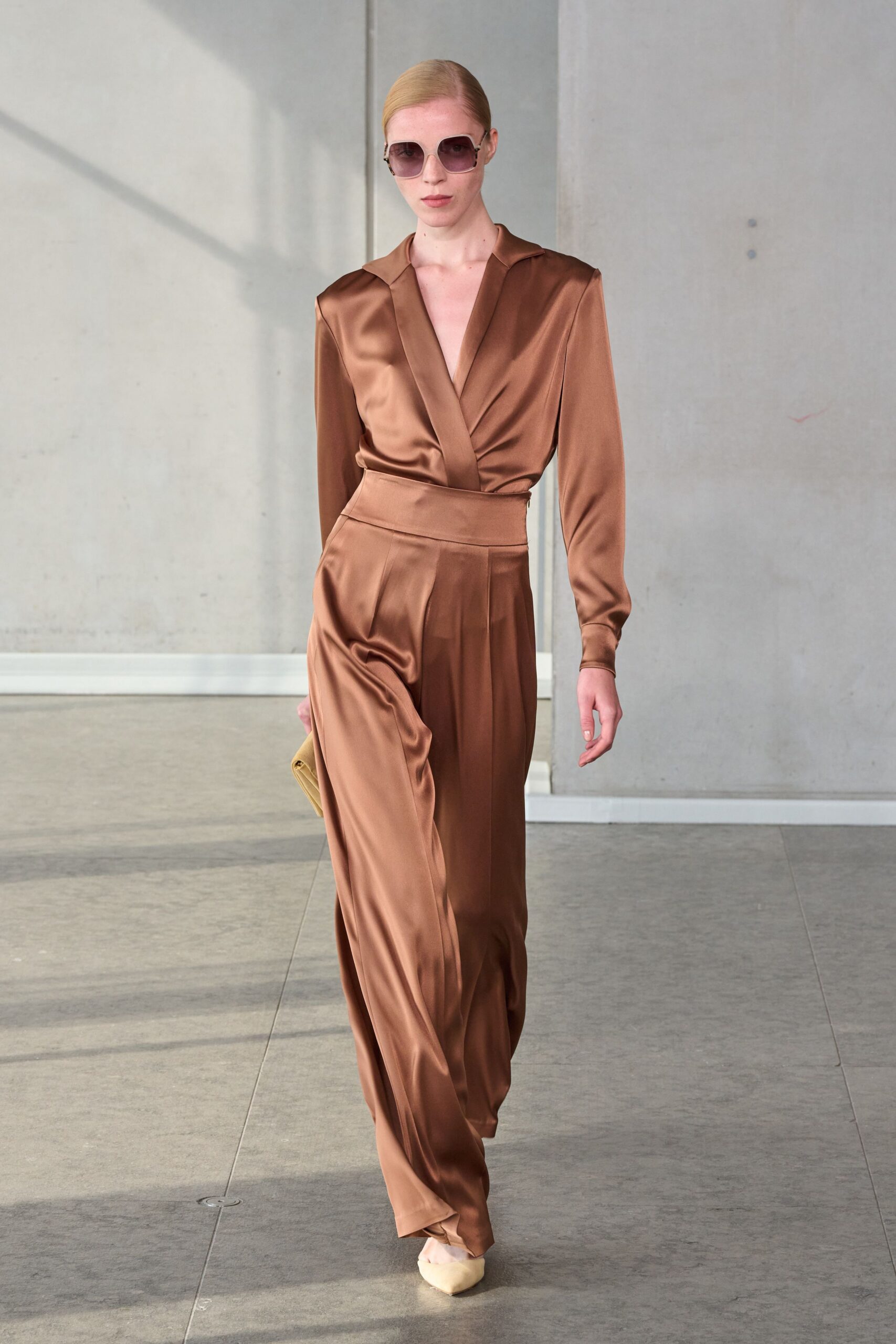 brown silk long-sleeve v-neck fitted flowing maxi gown