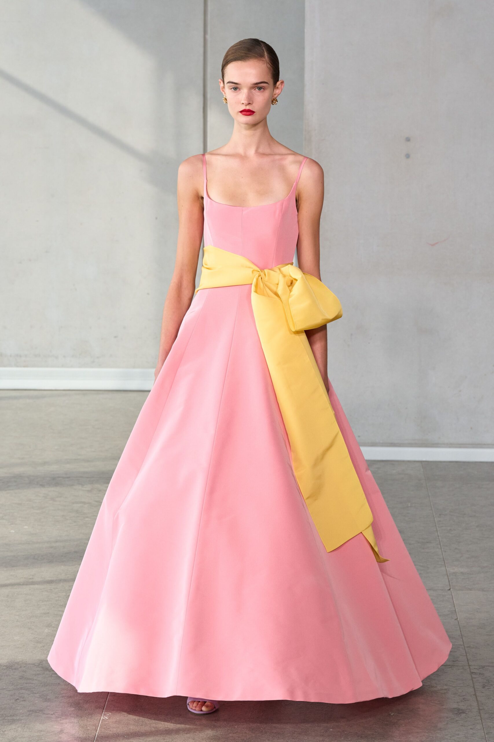 pink silk sleeveless v-neck fitted a-line belted gown