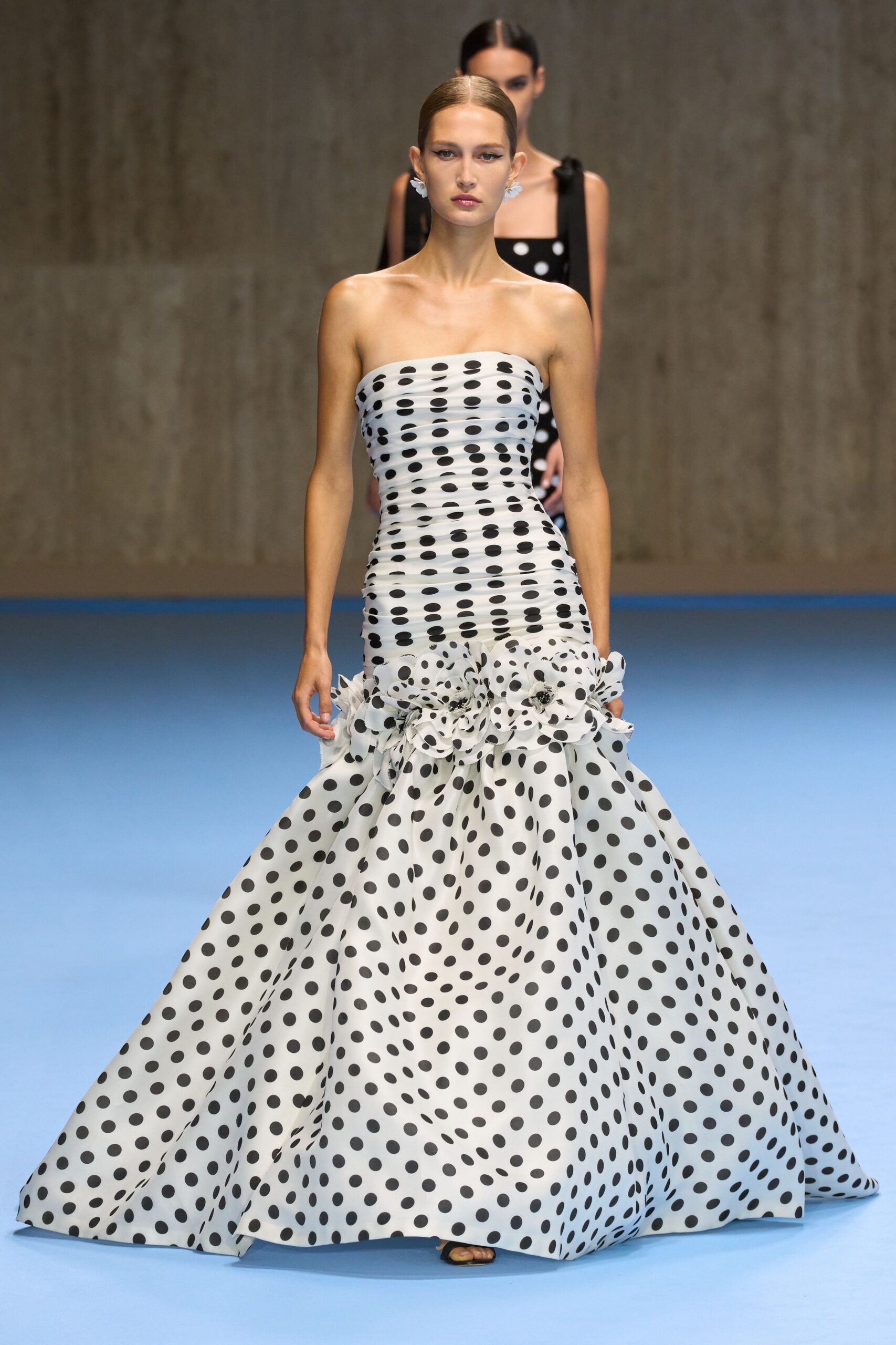 white and black polka-dot gown