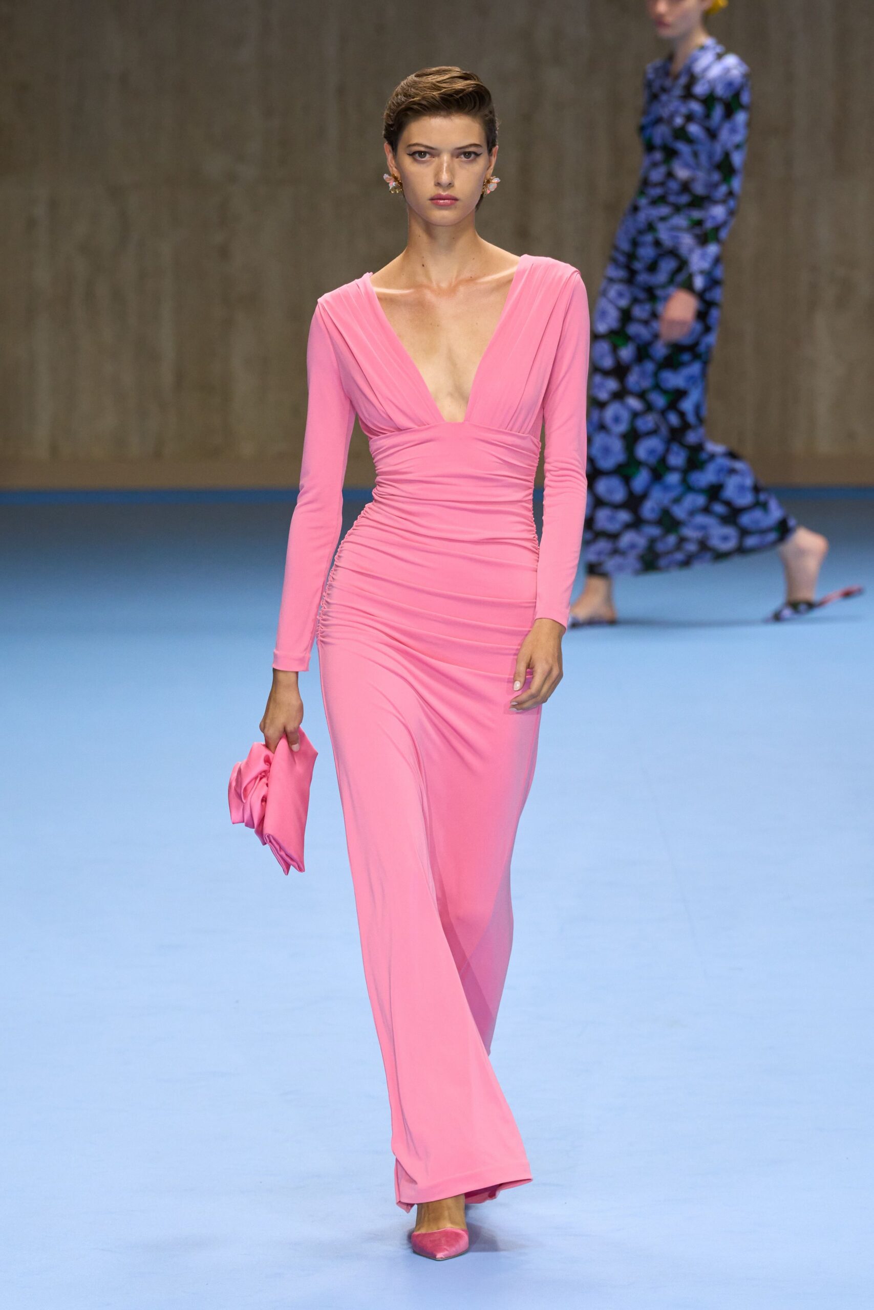 fitted pink gown with long sleeves