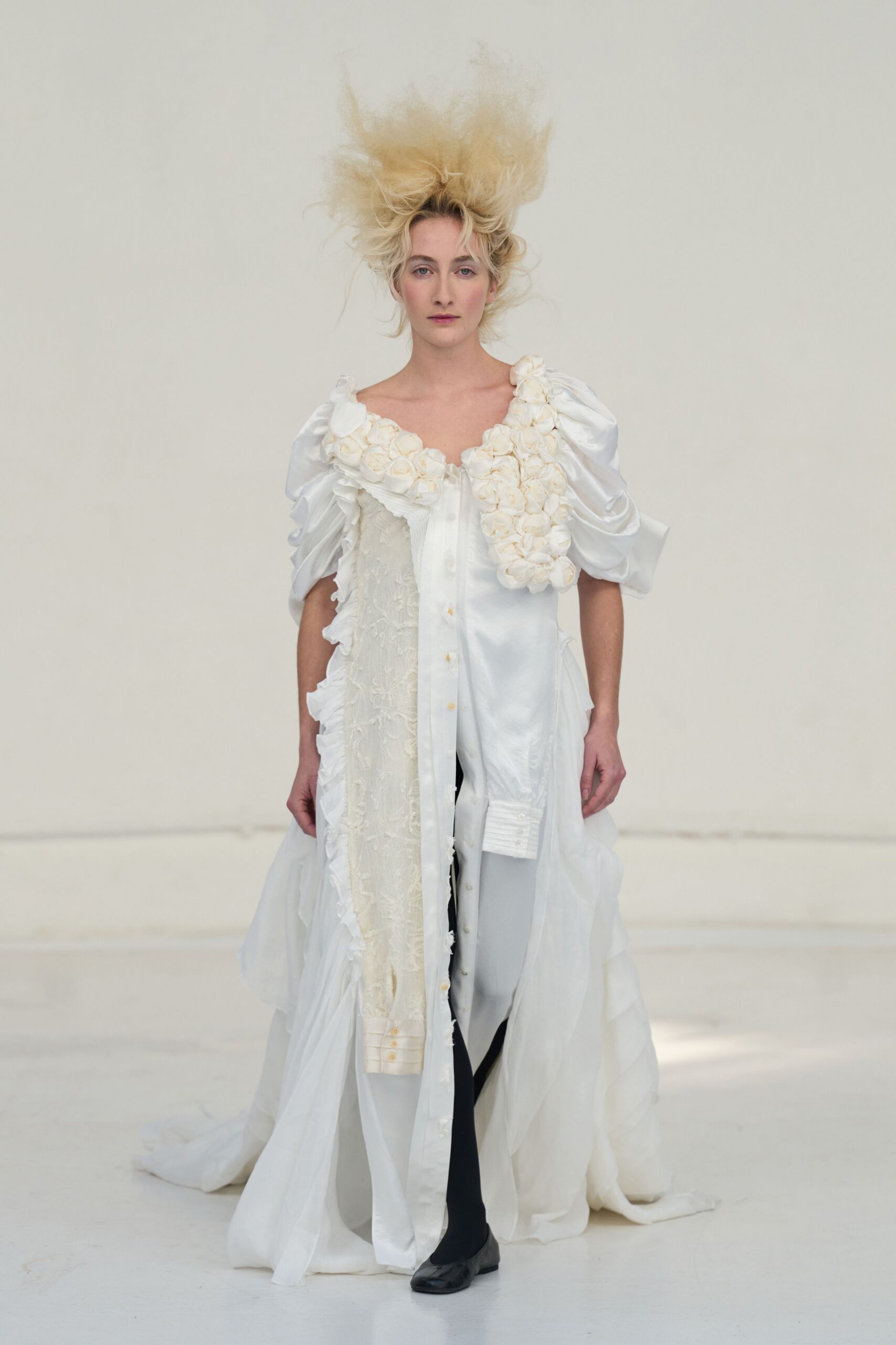 white silk long-sleeve v-neck fitted ruffled layered gown
