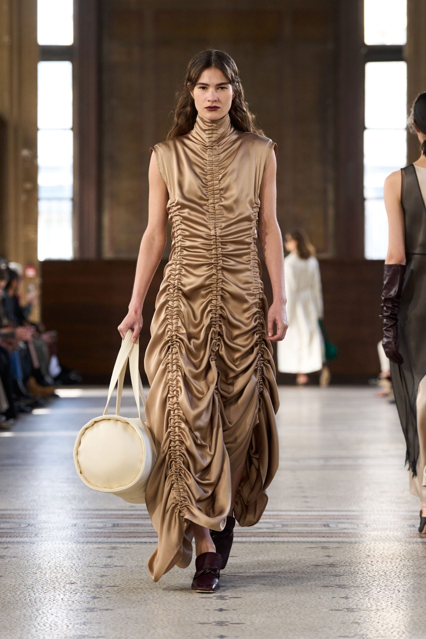 beige silk sleeveless high-neck fitted ruched flowing dress
