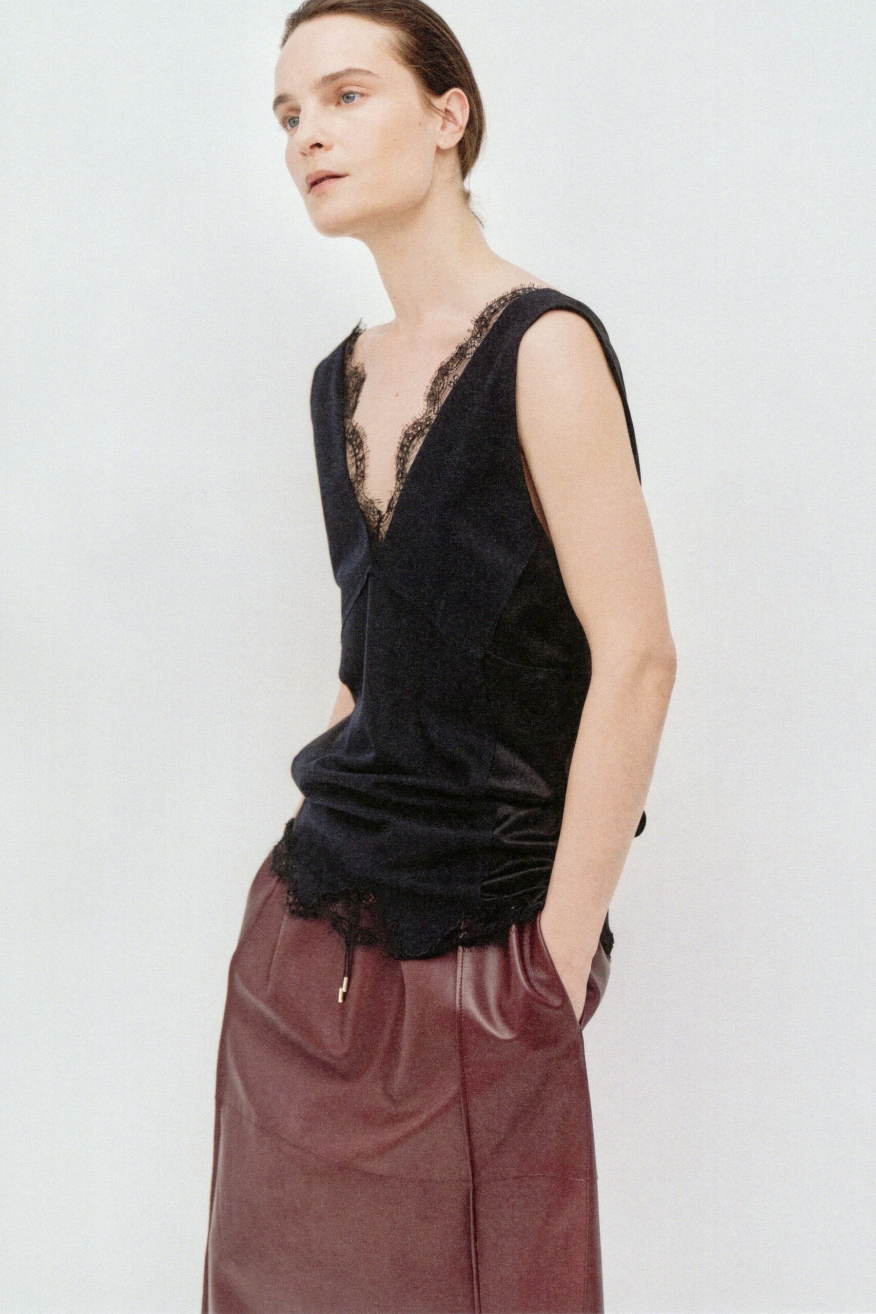 black silk sleeveless v-neck fitted top
