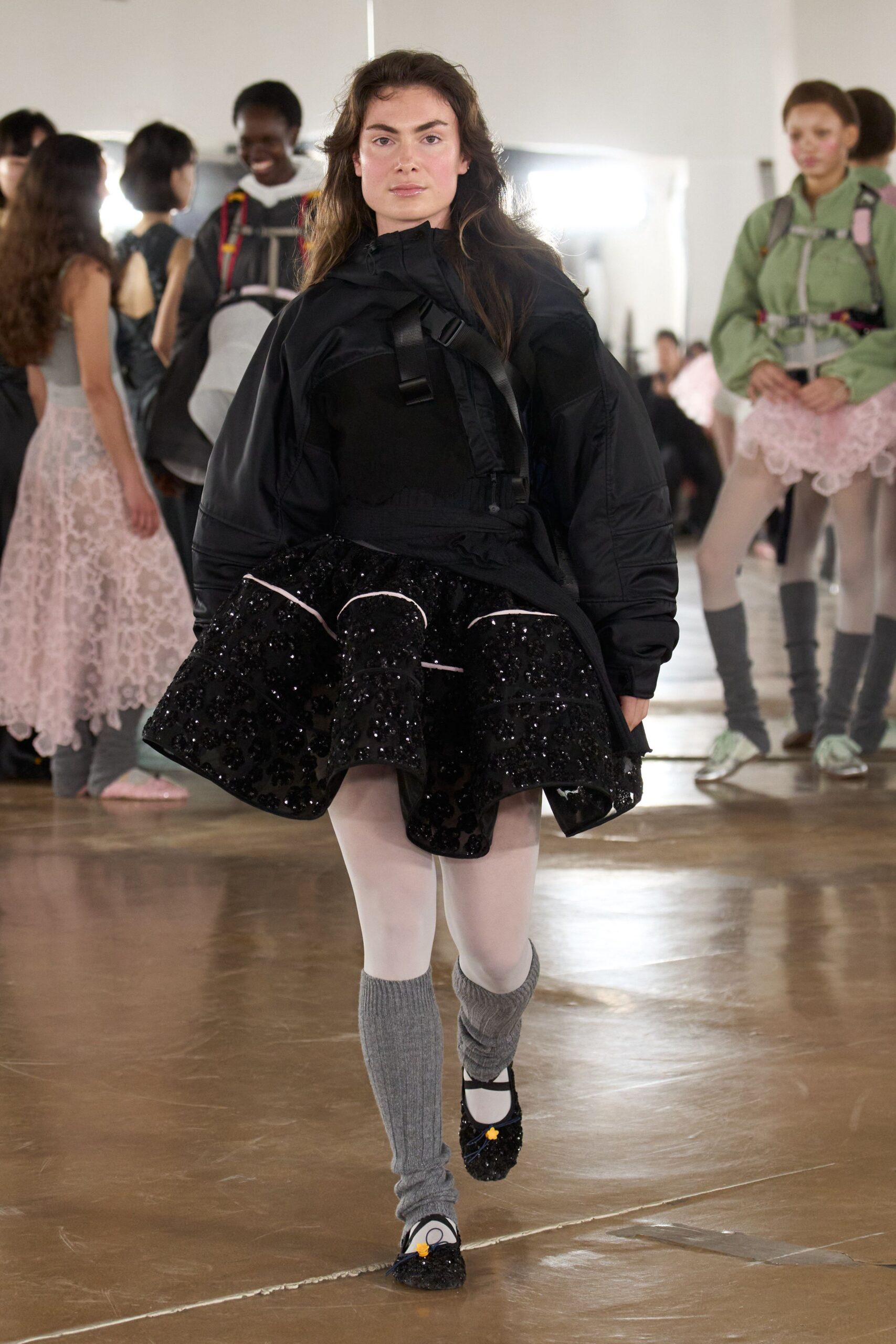 black oversized jacket and mini skirt